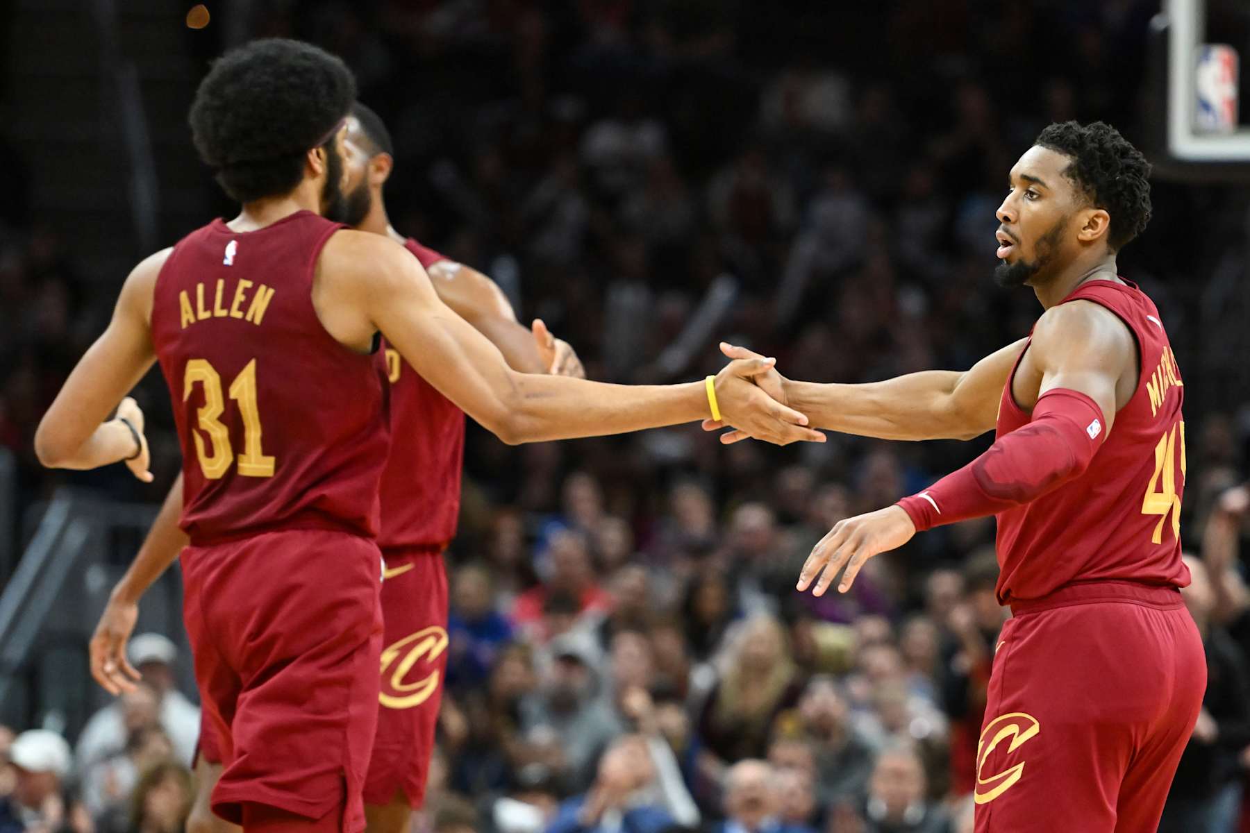 CLEVELAND, OHIO - APRIL 12: Donovan Mitchell #45 and Jarrett Allen #31 of the Cleveland Cavaliers celebrate during the first half against the Indiana Pacers at Rocket Mortgage Fieldhouse on April 12, 2024 in Cleveland, Ohio. NOTE TO USER: User expressly acknowledges and agrees that, by downloading and or using this photograph, User is consenting to the terms and conditions of the Getty Images License Agreement. (Photo by Nick Cammett/Getty Images)