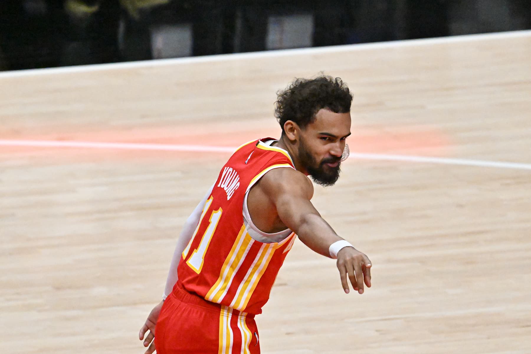ATLANTA, GEORGIA - NOVEMBER 06: Trae Young #11 of the Atlanta Hawks warms up before the game against the New York Knicks on November 6, 2024 at State Farm Arena in Atlanta, Georgia. NOTE TO USER: User expressly acknowledges and agrees that, by downloading and or using this photograph, User is consenting to the terms and conditions of the Getty Images License Agreement.  (Photo by Paras Griffin/Getty Images)