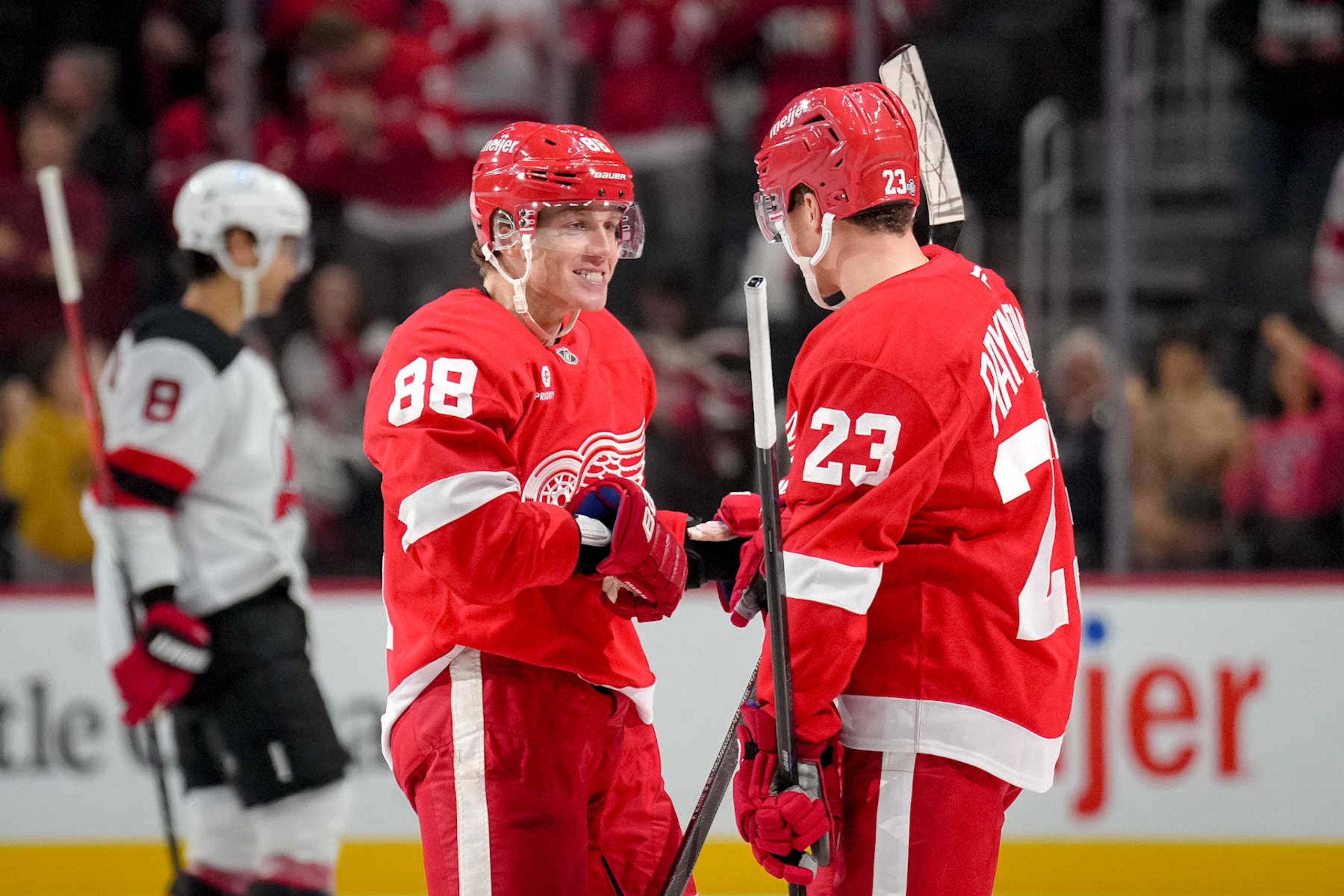 Patrick Kane and Lucas Raymond. Patrick Kane and Lucas Raymond.