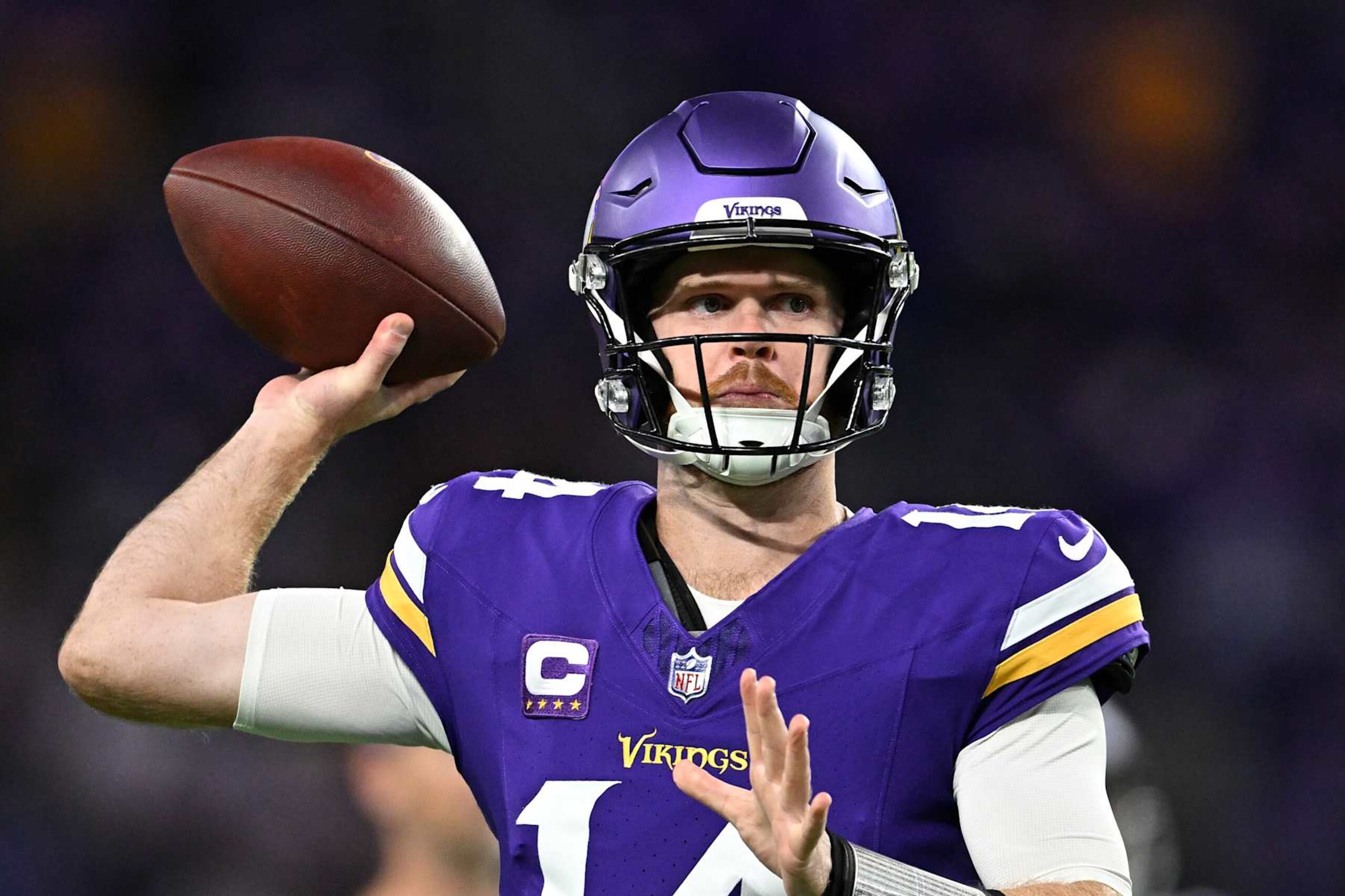 MINNEAPOLIS, MINNESOTA - NOVEMBER 03: Sam Darnold #14 of the Minnesota Vikings warms up prior to the game against the Indianapolis Colts at U.S. Bank Stadium on November 03, 2024 in Minneapolis, Minnesota. (Photo by Stephen Maturen/Getty Images)