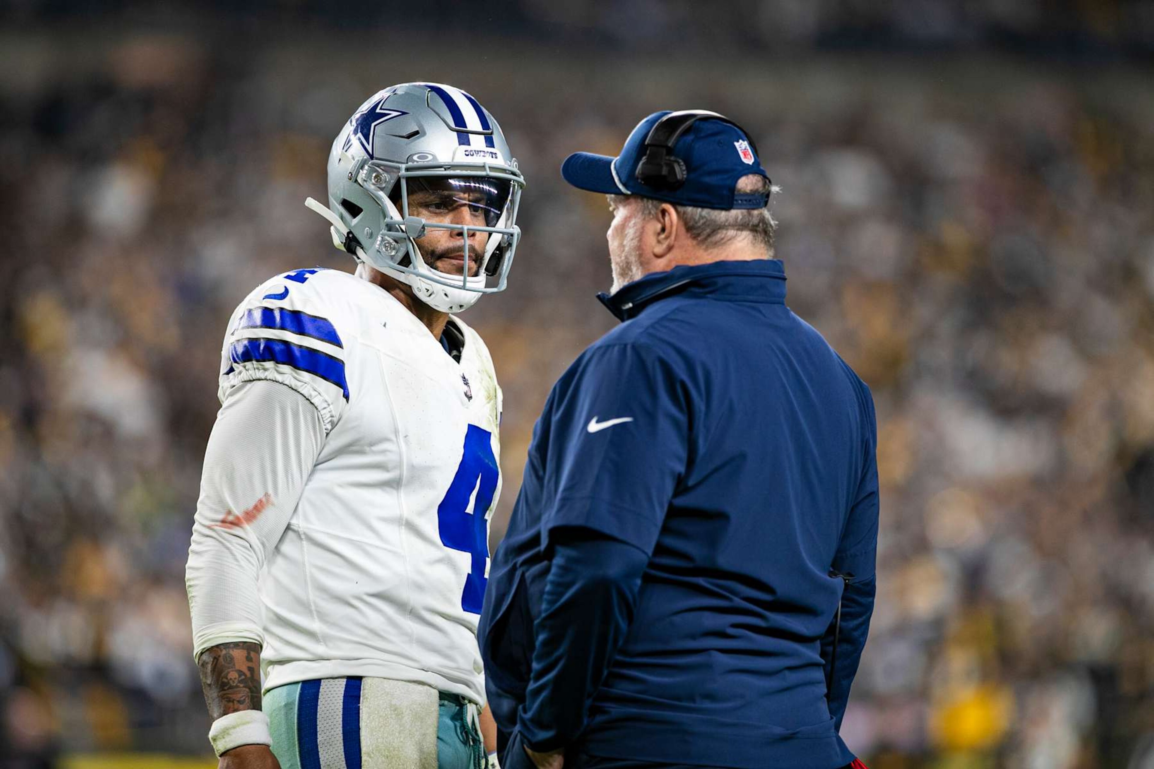 PITTSBURGH, PA - OCTOBER 06: Dallas Cowboys quarterback Dak Prescott (4) talks with Dallas Cowboys head coach Mike McCarthy during the regular season NFL football game between the Dallas Cowboys and Pittsburgh Steelers on October 06, 2024 at Acrisure Stadium in Pittsburgh, PA. (Photo by Mark Alberti/Icon Sportswire via Getty Images)