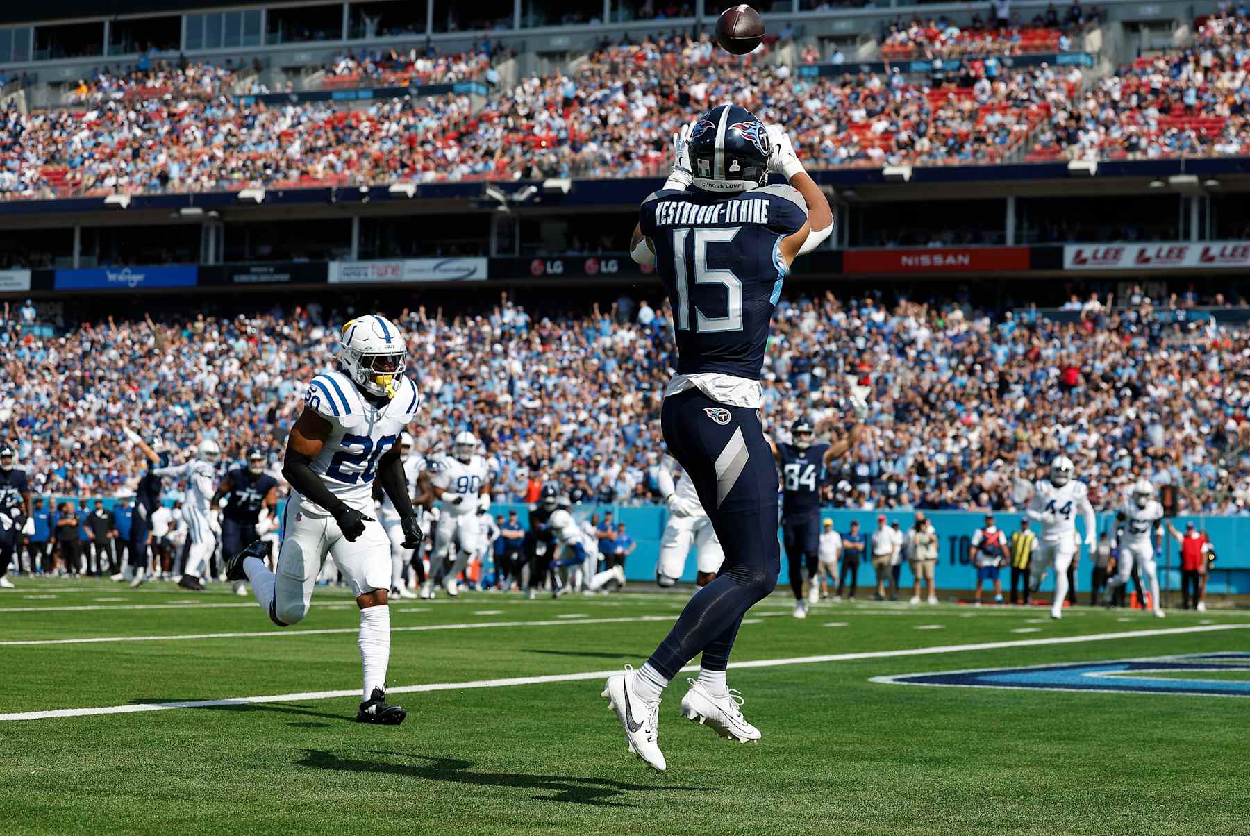 NASHVILLE, TENNESSEE - OCTOBER 13: Nick Westbrook-Ikhine #15 of the Tennessee Titans catches a touchdown pass against the Indianapolis Colts during the first quarter at Nissan Stadium on October 13, 2024 in Nashville, Tennessee. (Photo by Wesley Hitt/Getty Images)
