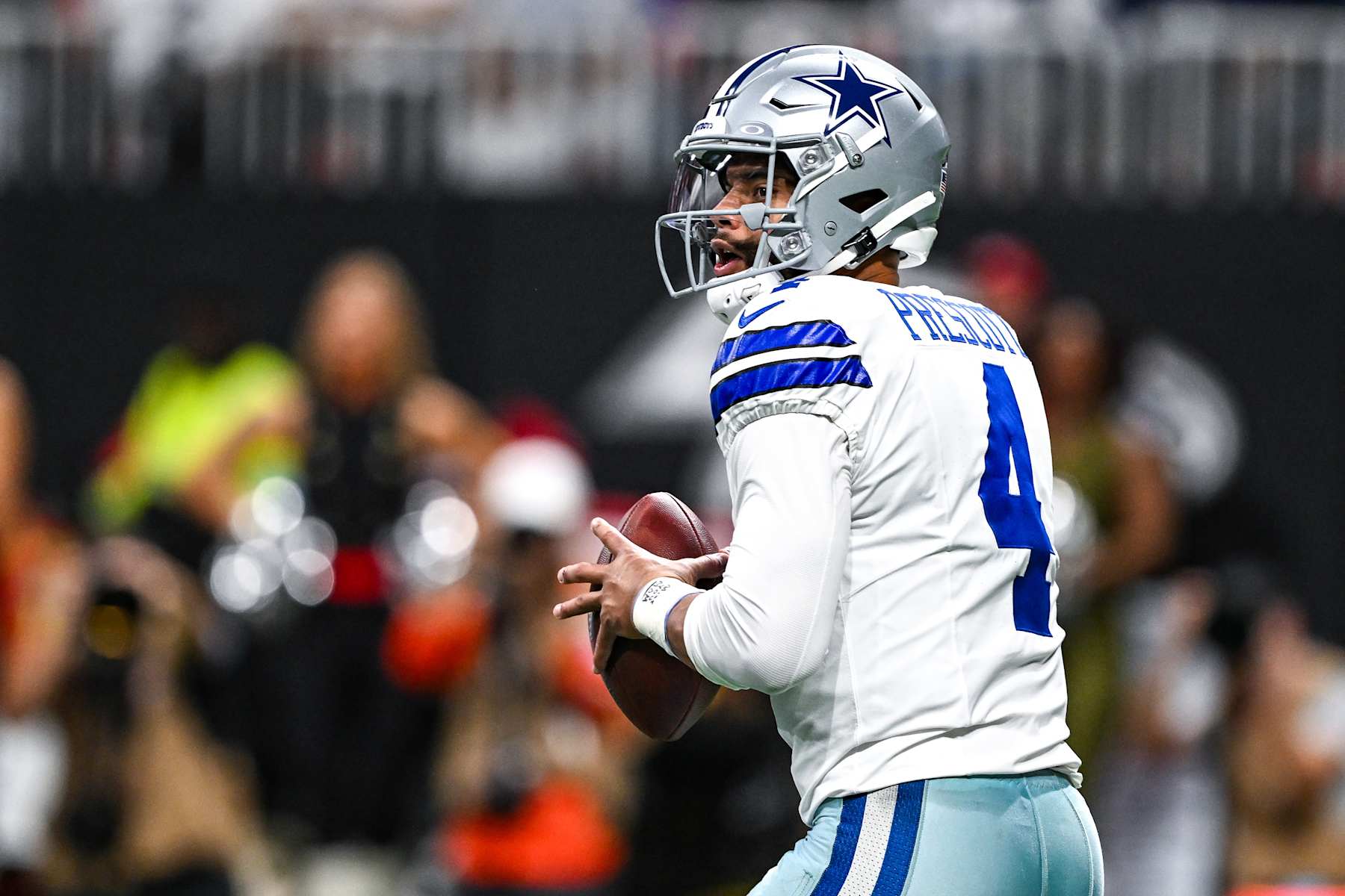 ATLANTA, GA  NOVEMBER 03:  Dallas quarterback Dak Prescott (4) drops back to pass during the NFL game between the Dallas Cowboys and the Atlanta Falcons on November 3rd, 2024 at Mercedes-Benz Stadium in Atlanta, GA.  (Photo by Rich von Biberstein/Icon Sportswire via Getty Images)