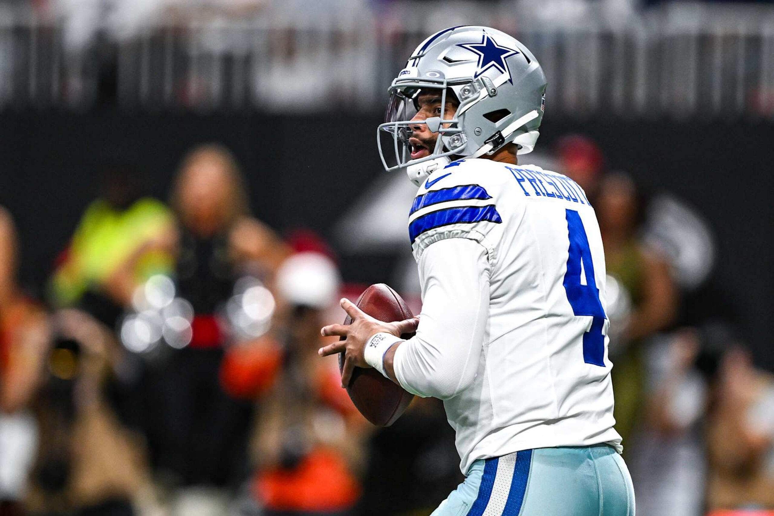 ATLANTA, GA  NOVEMBER 03:  Dallas quarterback Dak Prescott (4) drops back to pass during the NFL game between the Dallas Cowboys and the Atlanta Falcons on November 3rd, 2024 at Mercedes-Benz Stadium in Atlanta, GA.  (Photo by Rich von Biberstein/Icon Sportswire via Getty Images)