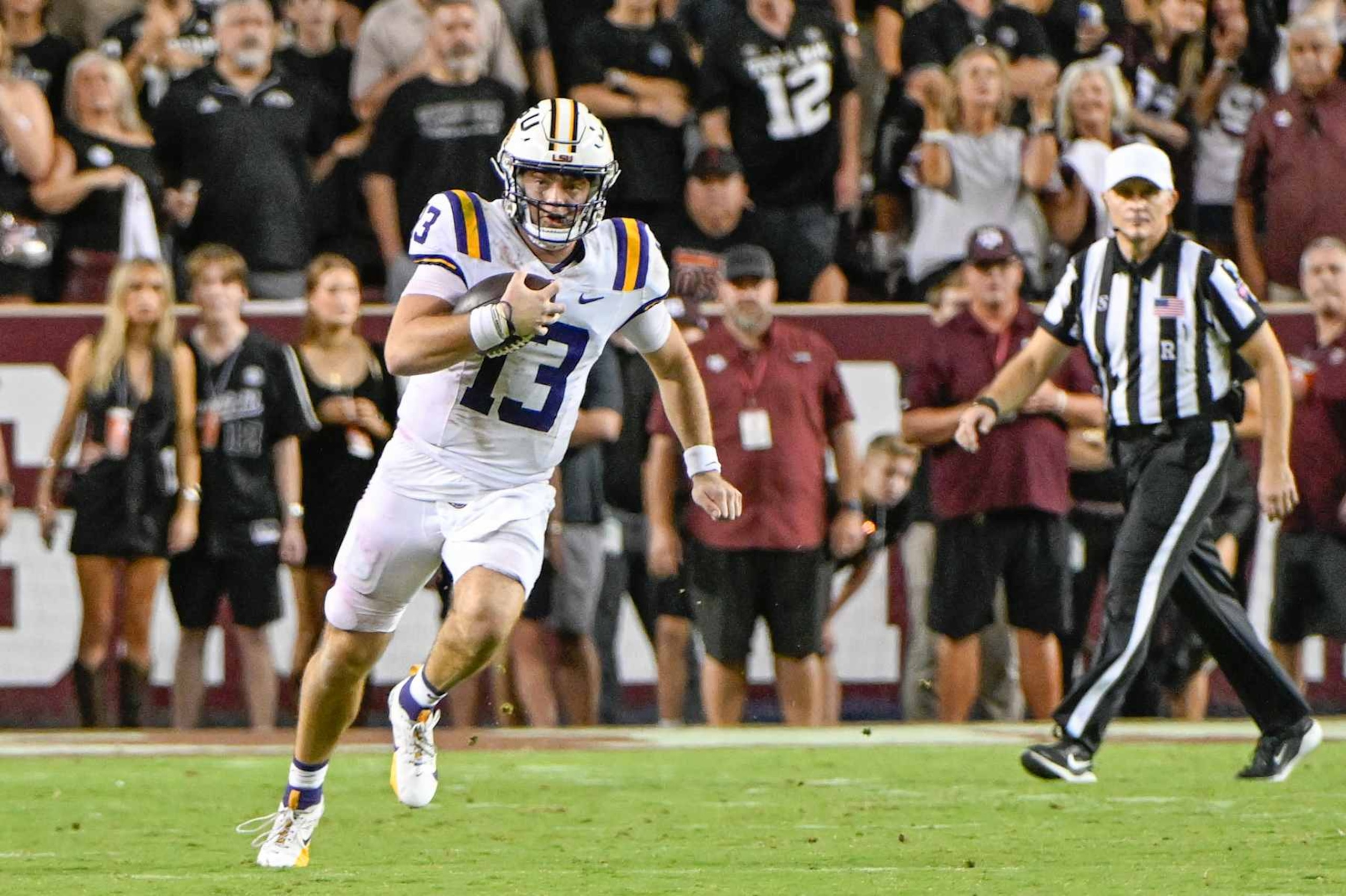 COLLEGE STATION, TX - OCTOBER 26: LSU Tigers quarterback Garrett Nussmeier (13) scrambles for a second half first down during the football game between the LSU Tigers and Texas A&M Aggies on October 26, 2024 at Kyle Field in College Station, Texas. (Photo by Ken Murray/Icon Sportswire via Getty Images) COLLEGE STATION, TX - OCTOBER 26: LSU Tigers quarterback Garrett Nussmeier (13) scrambles for a second half first down during the football game between the LSU Tigers and Texas A&M Aggies on October 26, 2024 at Kyle Field in College Station, Texas. (Photo by Ken Murray/Icon Sportswire via Getty Images)