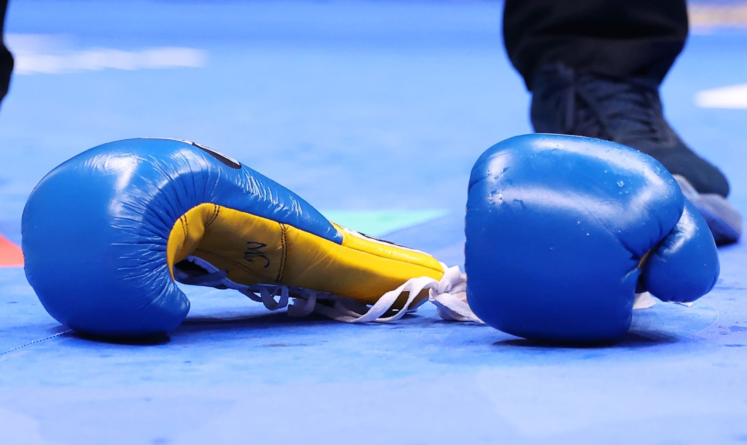 LONDON, ENGLAND - SEPTEMBER 21: A detailed view of Josh Warrington gloves after he threw them down as he reacts to defeat to Anthony Cacace (not pictured) in the IBO World Super Featherweight Title fight between Anthony Cacace and Josh Warrington , on the Riyadh Season  - Wembley Edition card at Wembley Stadium on September 21, 2024 in London, England. (Photo by Richard Pelham/Getty Images)