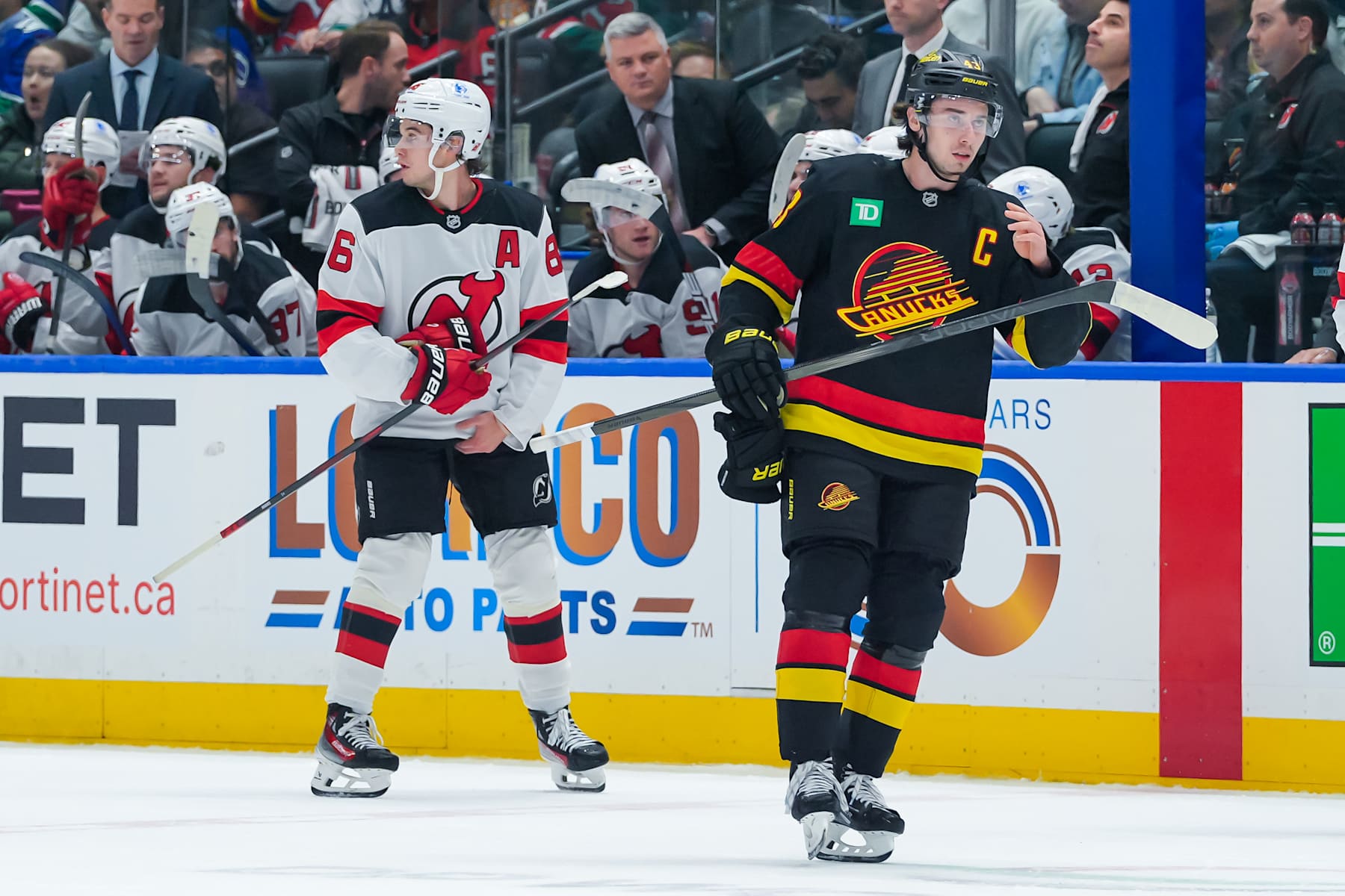 New Jersey Devils forward Jack Hughes (left) and Vancouver Canucks defenseman Quinn Hughes. New Jersey Devils forward Jack Hughes (left) and Vancouver Canucks defenseman Quinn Hughes.