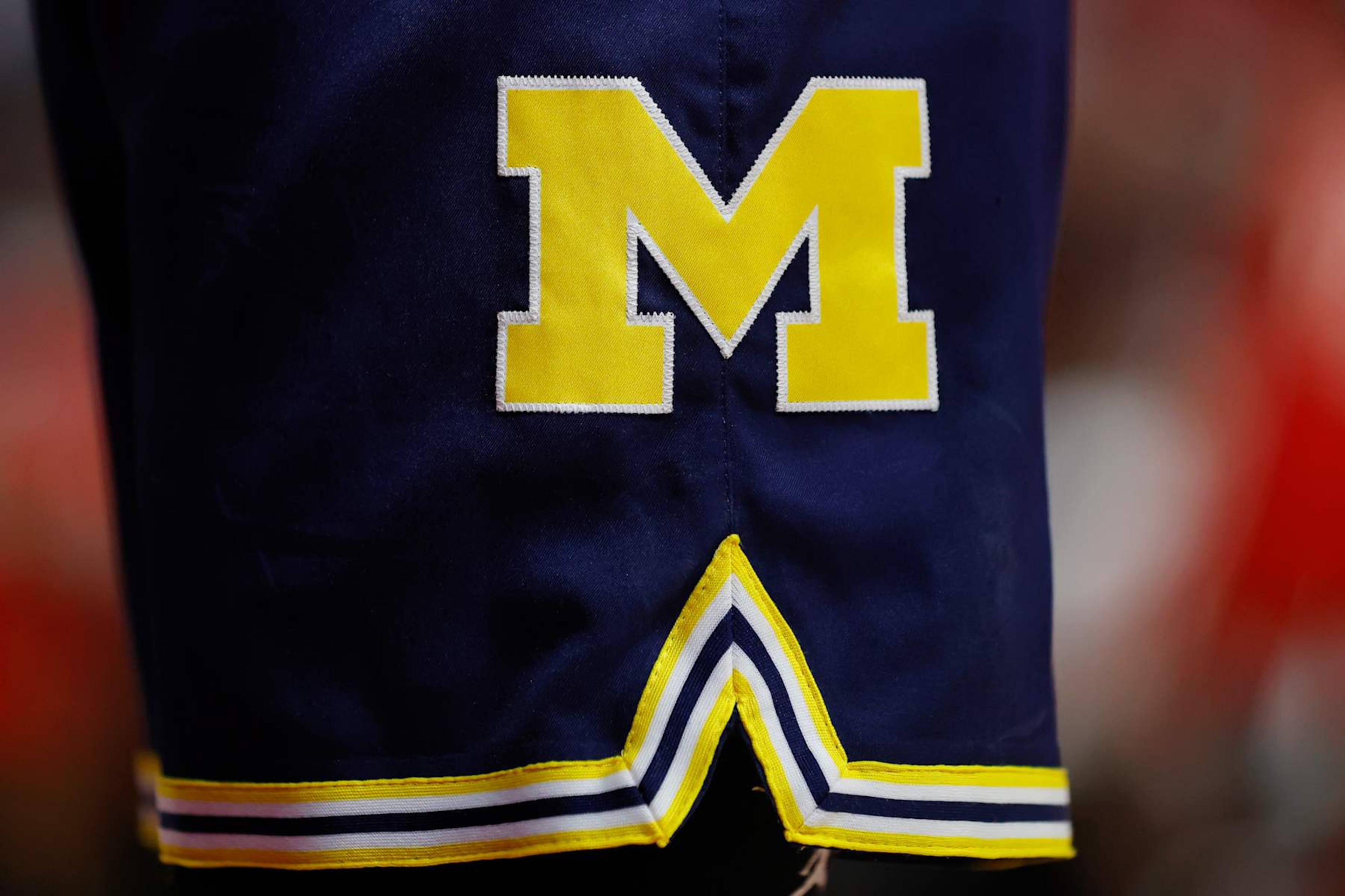 PISCATAWAY, NEW JERSEY - FEBRUARY 29: The Michigan Wolverines logo on the uniform shorts worn during a game against the Rutgers Scarlet Knights at Jersey Mike's Arena on February 29, 2024 in Piscataway, New Jersey. Rutgers defeated Michigan 82-52. (Photo by Rich Schultz/Getty Images) PISCATAWAY, NEW JERSEY - FEBRUARY 29: The Michigan Wolverines logo on the uniform shorts worn during a game against the Rutgers Scarlet Knights at Jersey Mike's Arena on February 29, 2024 in Piscataway, New Jersey. Rutgers defeated Michigan 82-52. (Photo by Rich Schultz/Getty Images)