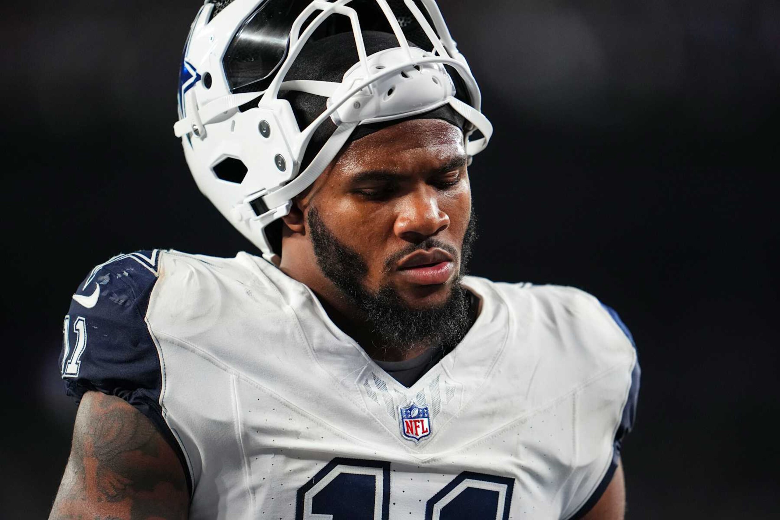 EAST RUTHERFORD, NJ - SEPTEMBER 26: Micah Parsons #11 of the Dallas Cowboys walks across the field during an NFL football game against the New York Giants at MetLife Stadium on September 26, 2024 in East Rutherford, New Jersey. (Photo by Cooper Neill/Getty Images)
