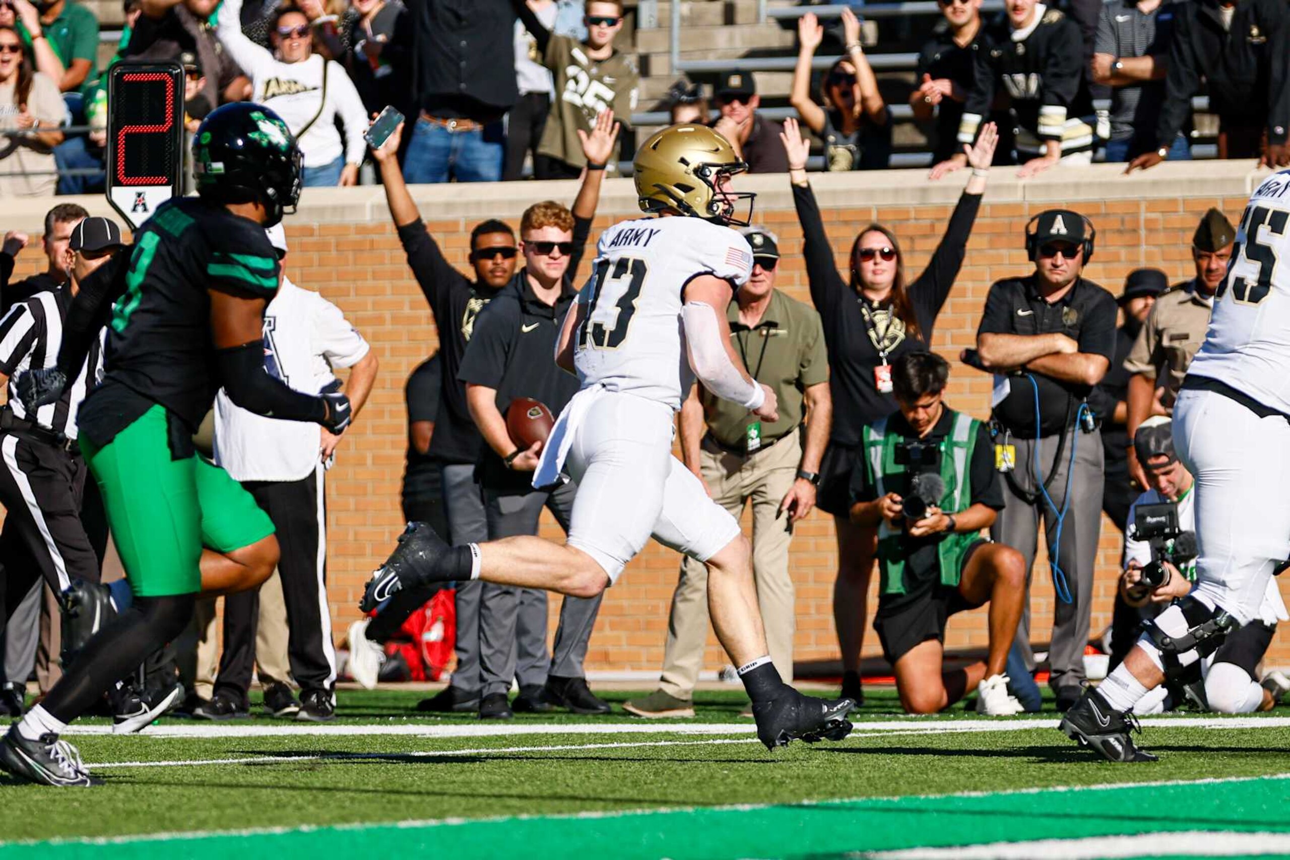 DENTON, TX - NOVEMBER 09: Army Black Knights quarterback Bryson Daily (13) runs in for a touchdown during the game between the North Texas Mean Green and the Army Black Knights on November 9, 2024 at DATCU Stadium in Denton, Texas. (Photo by Matthew Pearce/Icon Sportswire via Getty Images)