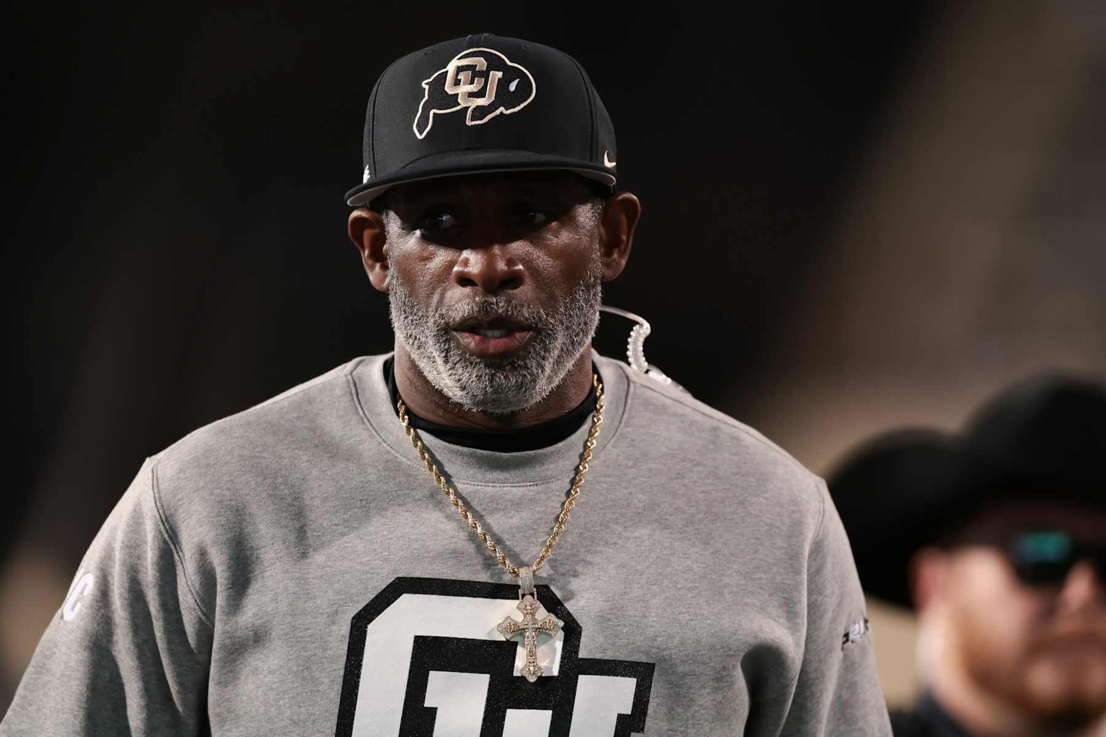 BOULDER, COLORADO - OCTOBER 26: Head coach Deion Sanders of the Colorado Buffaloes walks the field prior to the game against the Cincinnati Bearcats at Folsom Field on October 26, 2024 in Boulder, Colorado. (Photo by Andrew Wevers/Getty Images) BOULDER, COLORADO - OCTOBER 26: Head coach Deion Sanders of the Colorado Buffaloes walks the field prior to the game against the Cincinnati Bearcats at Folsom Field on October 26, 2024 in Boulder, Colorado. (Photo by Andrew Wevers/Getty Images)