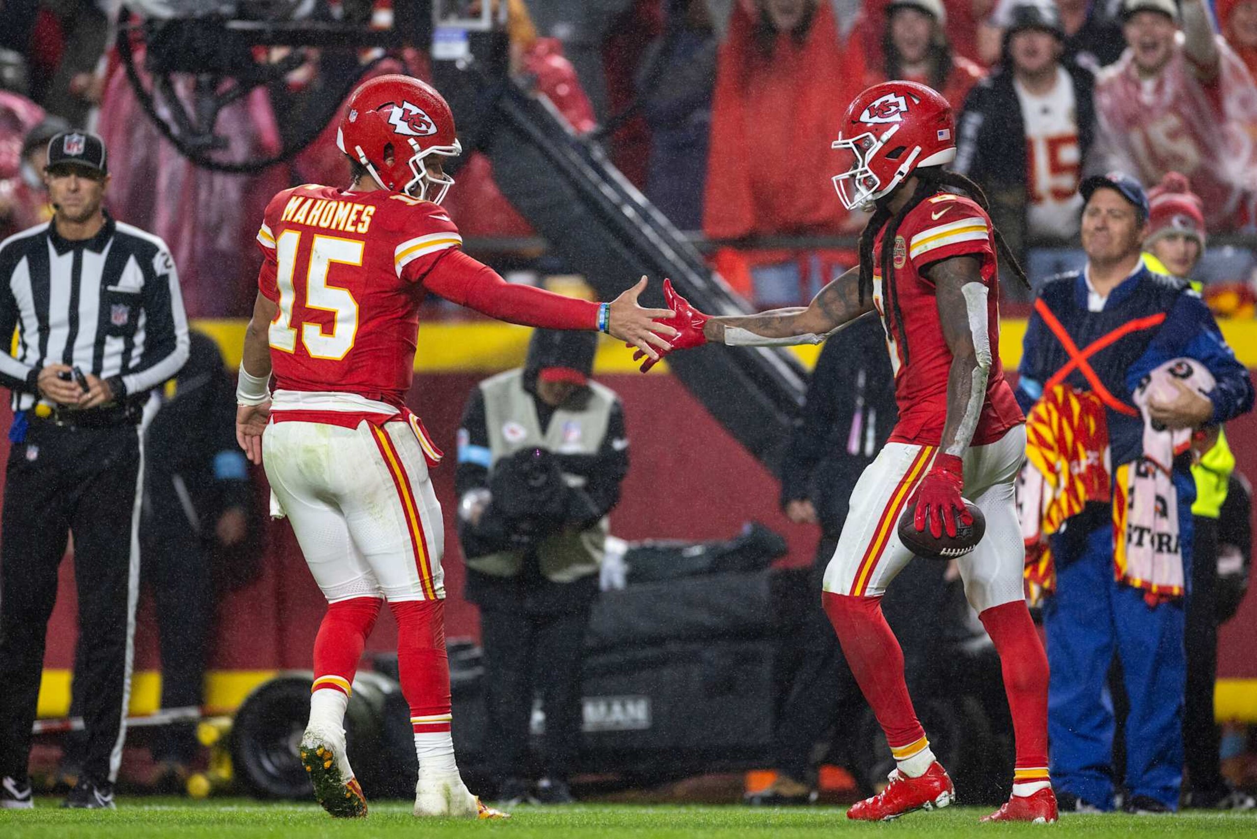 KANSAS CITY, MISSOURI - NOVEMBER 04: DeAndre Hopkins #8 of the Kansas City Chiefs celebrates with his teammate Patrick Mahomes #15 of the Kansas City Chiefs after scoring a touchdown during an NFL Football game against the Tampa Bay Buccaneers at GEHA Field at Arrowhead Stadium on November 04, 2024 in Kansas City, Missouri. (Photo by Michael Owens/Getty Images)