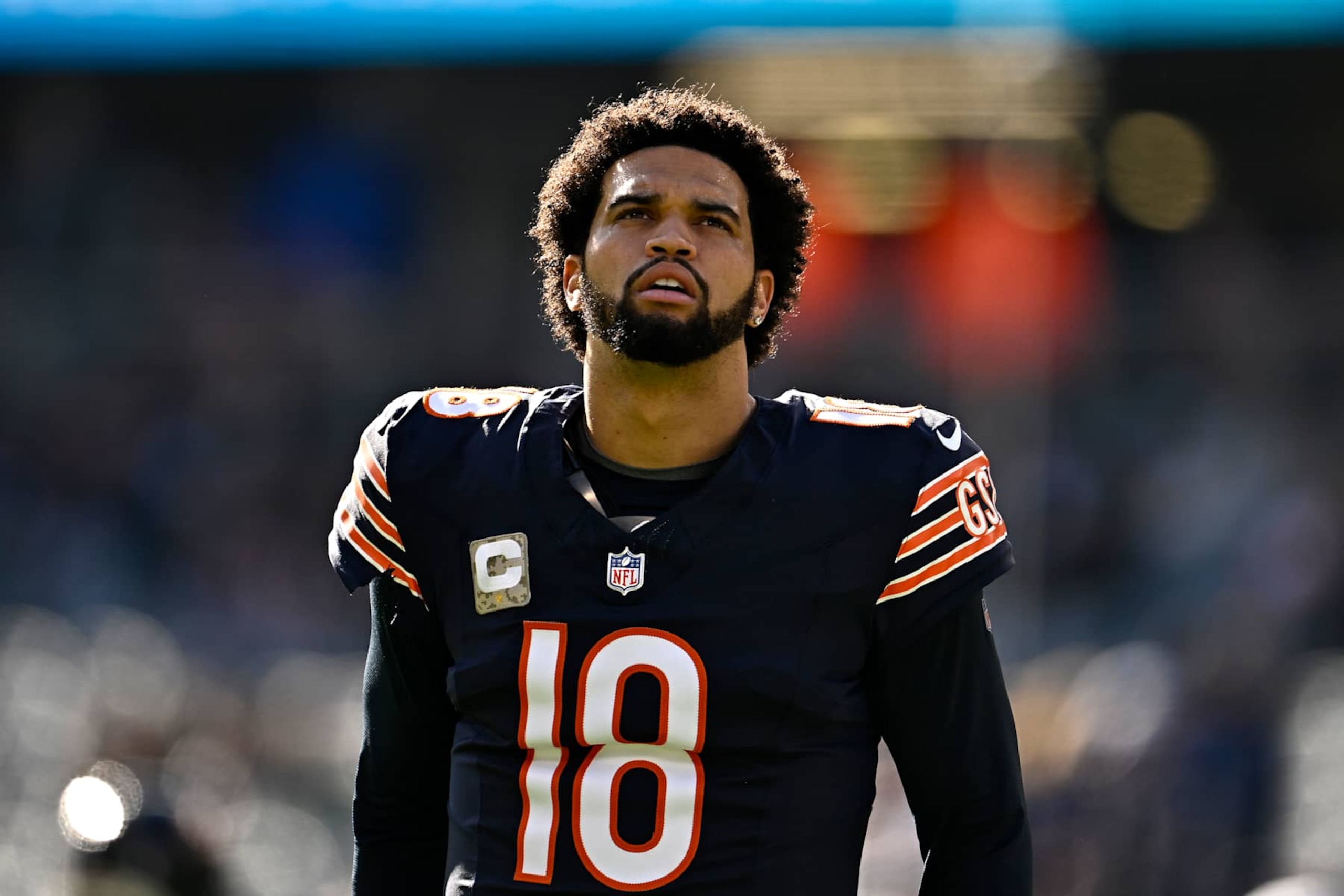 CHICAGO, ILLINOIS - NOVEMBER 10: Caleb Williams #18 of the Chicago Bears looks on before the game against the New England Patriots at Soldier Field on November 10, 2024 in Chicago, Illinois. (Photo by Quinn Harris/Getty Images) CHICAGO, ILLINOIS - NOVEMBER 10: Caleb Williams #18 of the Chicago Bears looks on before the game against the New England Patriots at Soldier Field on November 10, 2024 in Chicago, Illinois. (Photo by Quinn Harris/Getty Images)