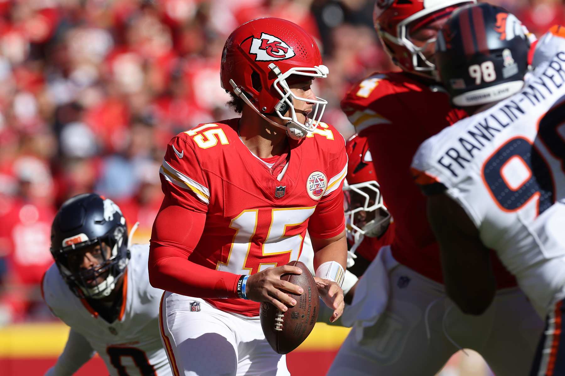 KANSAS CITY, MISSOURI - NOVEMBER 10: Patrick Mahomes #15 of the Kansas City Chiefs looks to pass in the first quarter of a game against the Denver Broncos at GEHA Field at Arrowhead Stadium on November 10, 2024 in Kansas City, Missouri. (Photo by Jamie Squire/Getty Images)