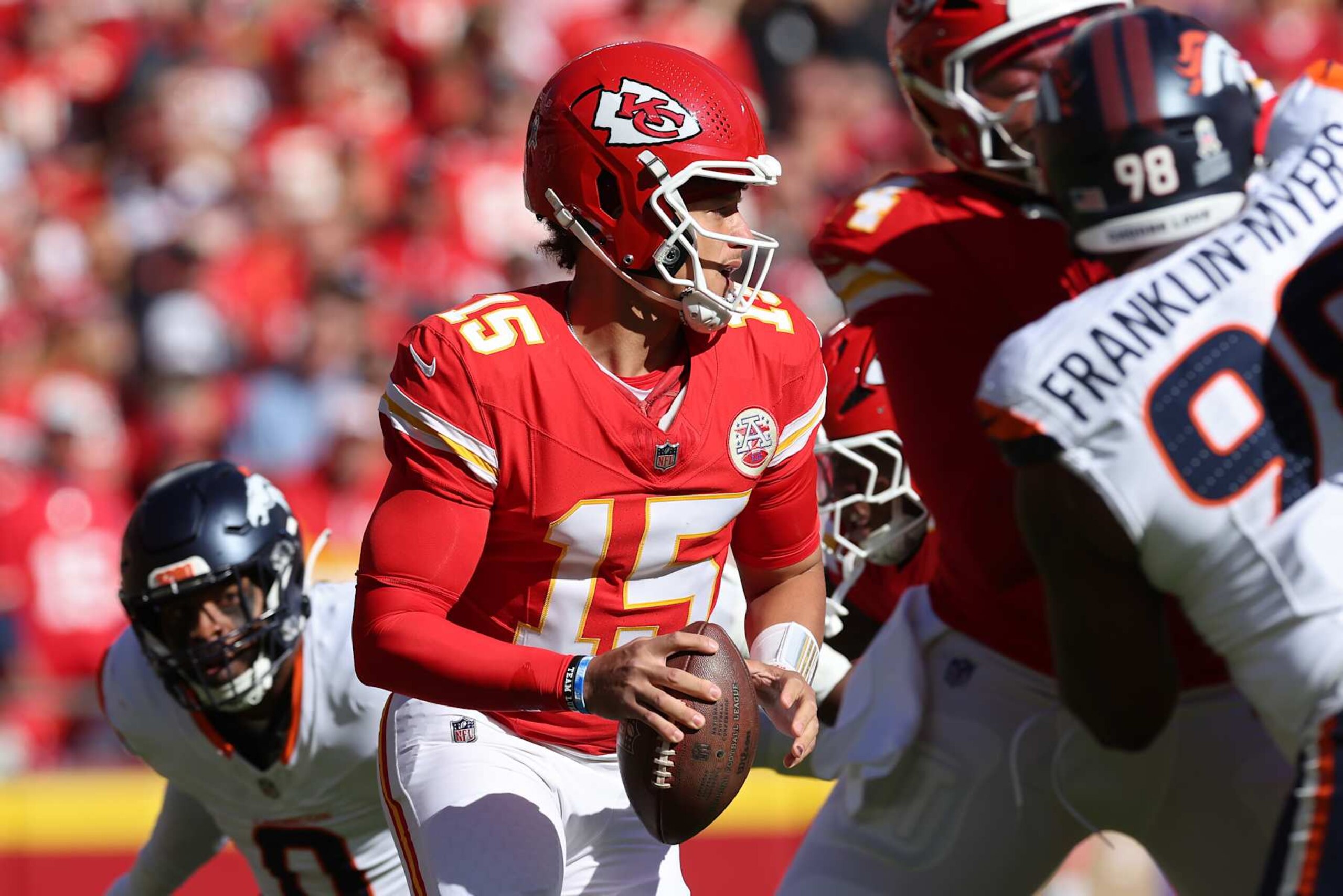 KANSAS CITY, MISSOURI - NOVEMBER 10: Patrick Mahomes #15 of the Kansas City Chiefs looks to pass in the first quarter of a game against the Denver Broncos at GEHA Field at Arrowhead Stadium on November 10, 2024 in Kansas City, Missouri. (Photo by Jamie Squire/Getty Images)