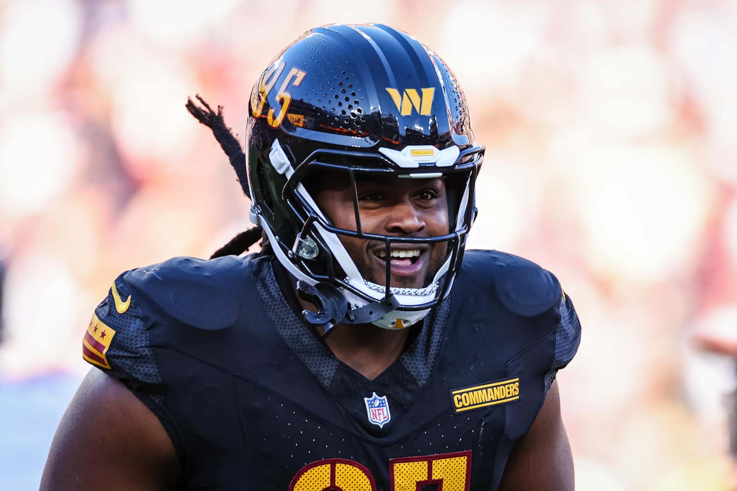 LANDOVER, MD - OCTOBER 27: JerZhan Newton #95 of the Washington Commanders celebrates after a play against the Chicago Bears during the first half of the game at Northwest Stadium on October 27, 2024 in Landover, Maryland. (Photo by Scott Taetsch/Getty Images)