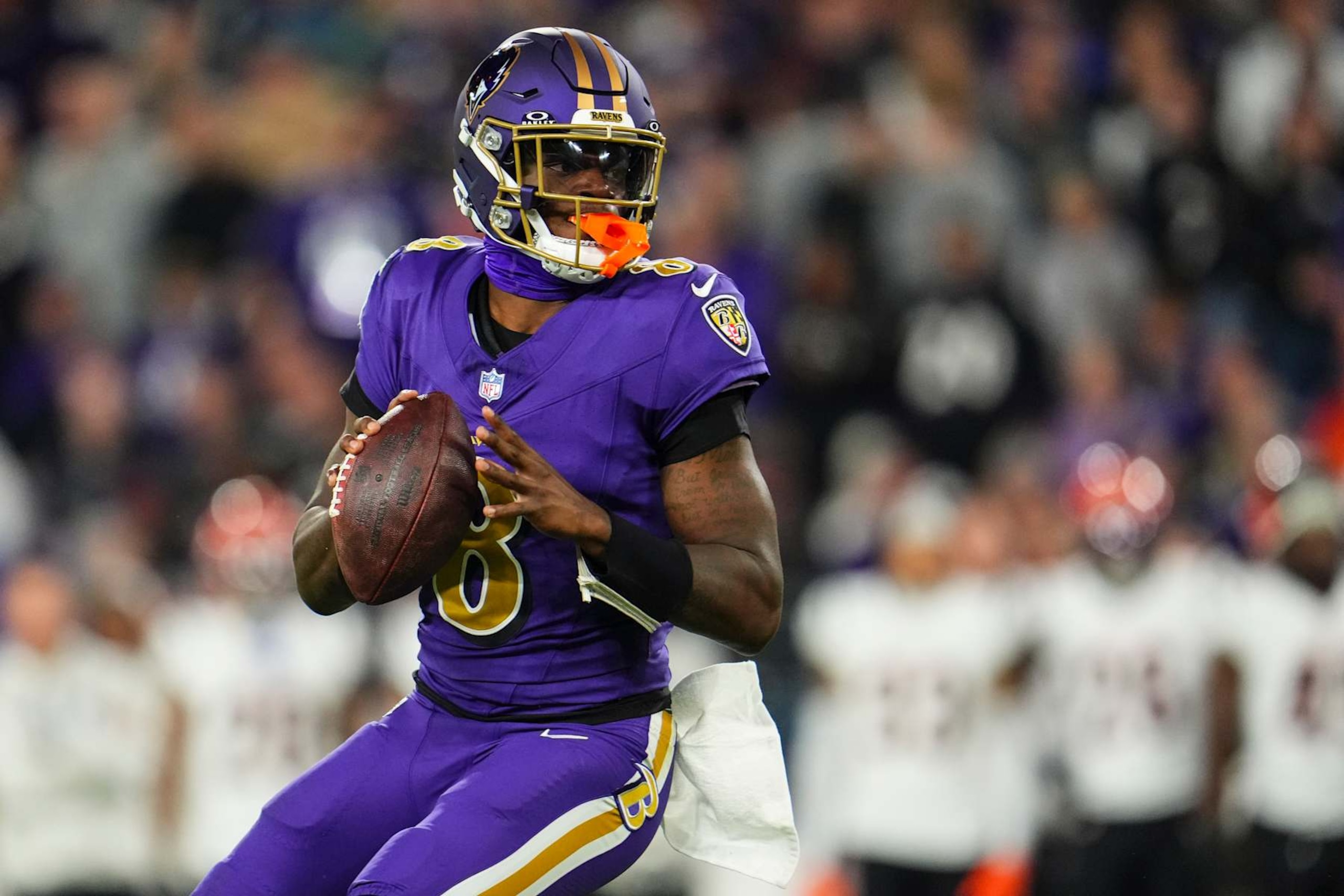 BALTIMORE, MD - NOVEMBER 07: Lamar Jackson #8 of the Baltimore Ravens drops back to pass during an NFL football game against the Cincinnati Bengals at M&T Bank Stadium on November 7, 2024 in Baltimore, Maryland. (Photo by Cooper Neill/Getty Images)