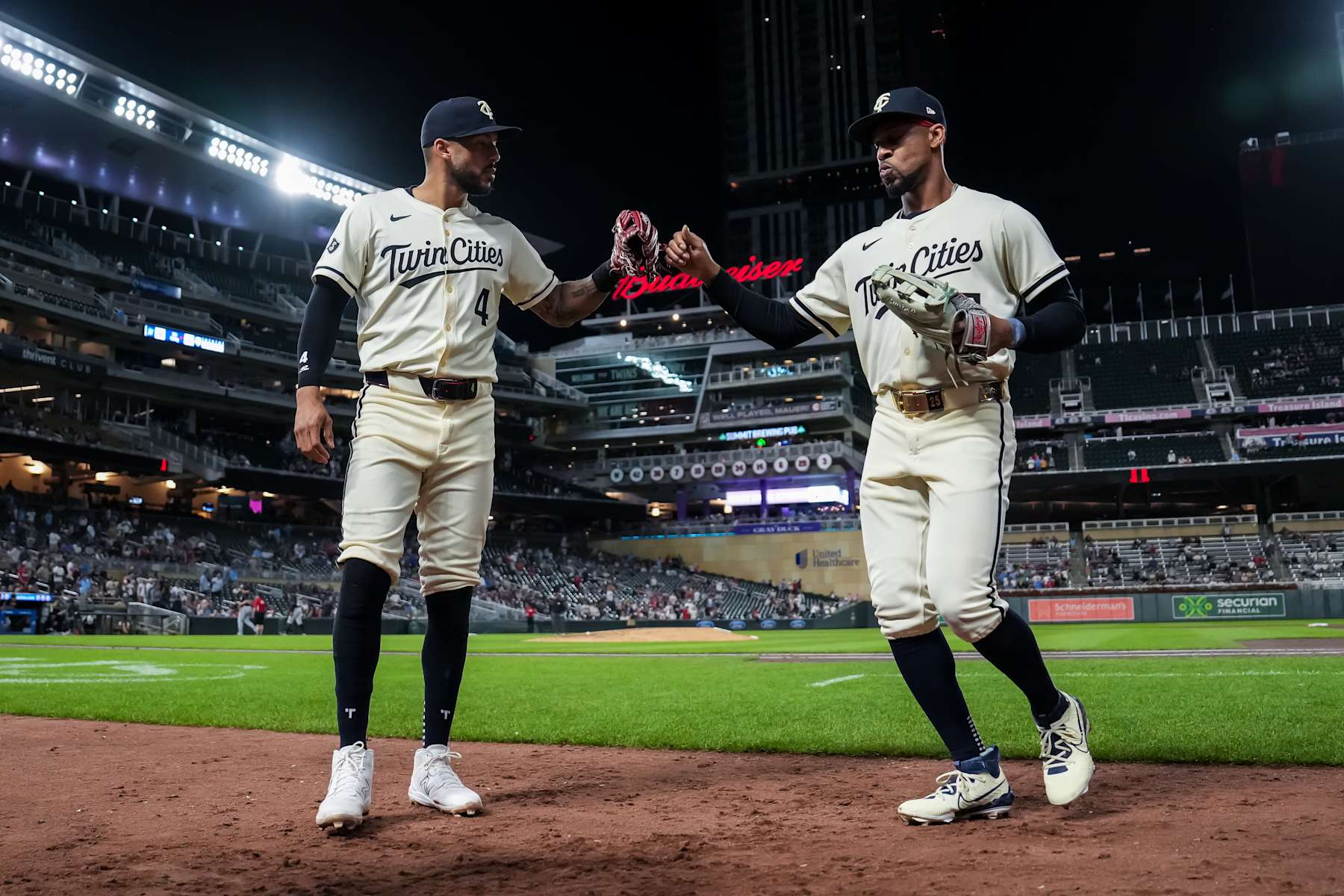 Carlos Correa (L) and Byron Buxton (R)