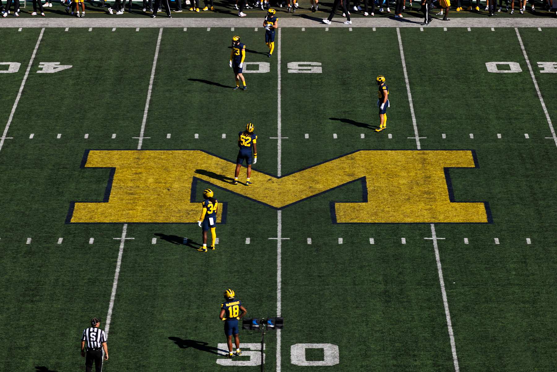 ANN ARBOR, MICHIGAN - SEPTEMBER 21: Michigan Wolverines logo on the field during a game against USC Trojans at Michigan Stadium on September 21, 2024 in Ann Arbor, Michigan. (Photo by Ric Tapia/Getty Images)