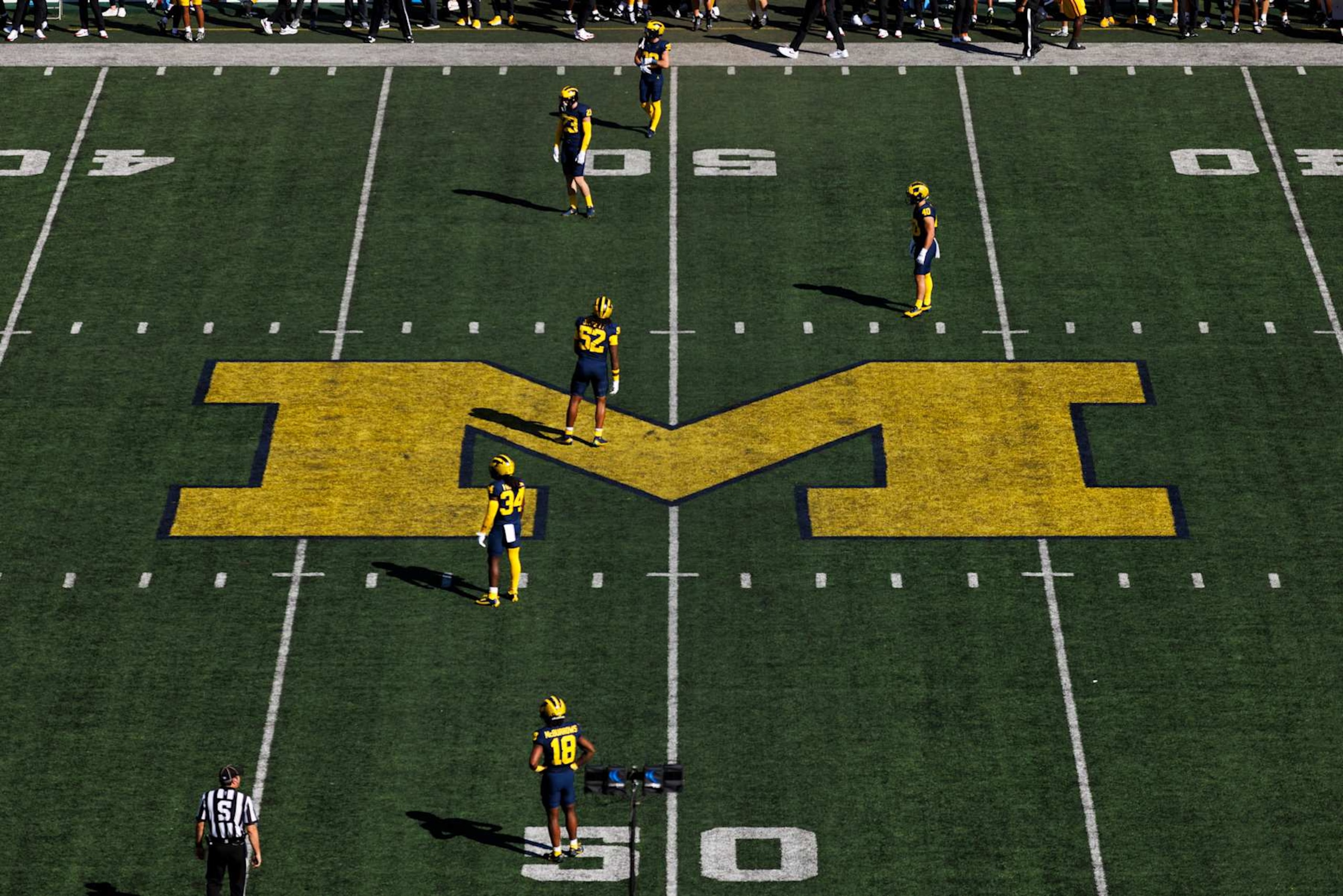 ANN ARBOR, MICHIGAN - SEPTEMBER 21: Michigan Wolverines logo on the field during a game against USC Trojans at Michigan Stadium on September 21, 2024 in Ann Arbor, Michigan. (Photo by Ric Tapia/Getty Images) ANN ARBOR, MICHIGAN - SEPTEMBER 21: Michigan Wolverines logo on the field during a game against USC Trojans at Michigan Stadium on September 21, 2024 in Ann Arbor, Michigan. (Photo by Ric Tapia/Getty Images)