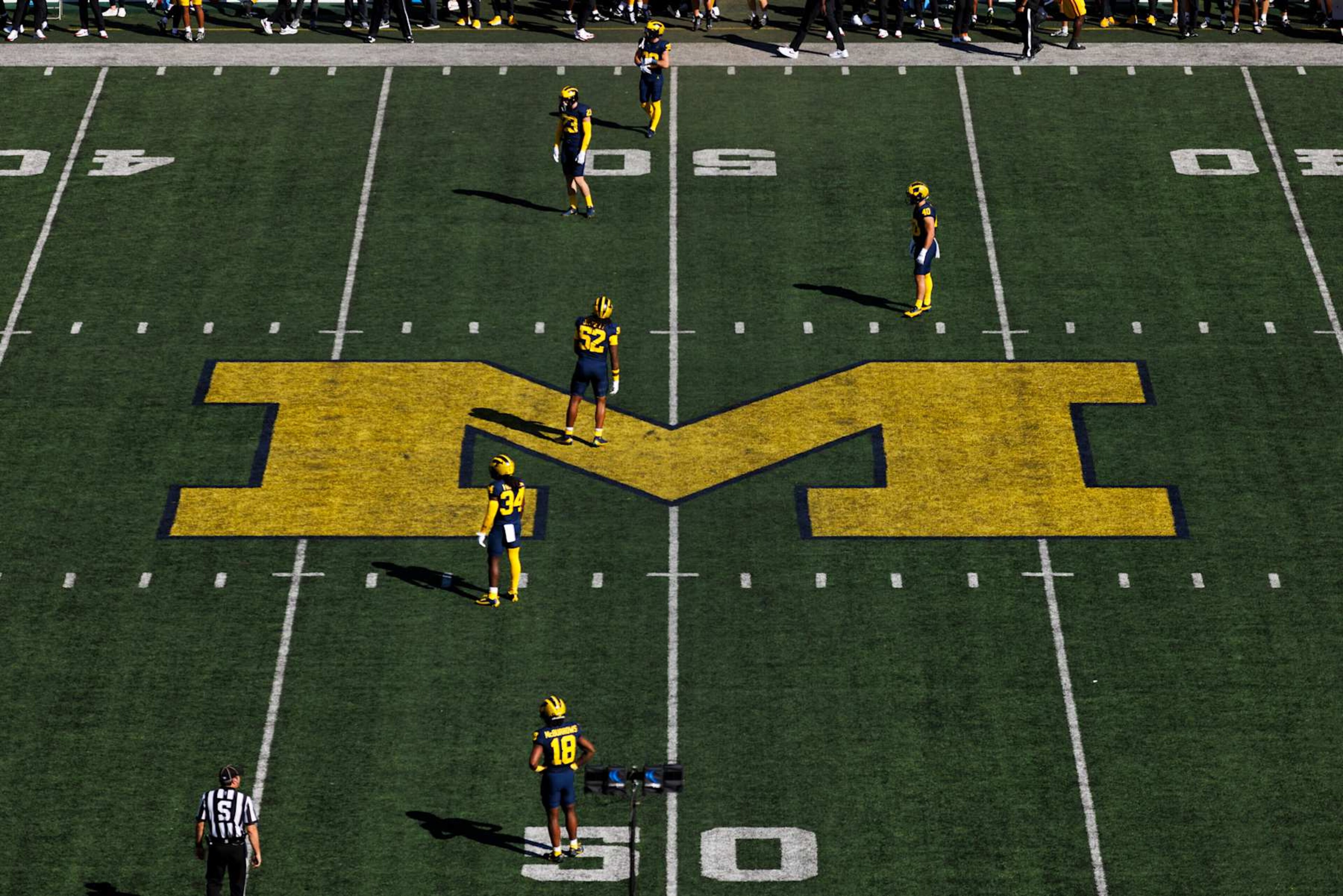 ANN ARBOR, MICHIGAN - SEPTEMBER 21: Michigan Wolverines logo on the field during a game against USC Trojans at Michigan Stadium on September 21, 2024 in Ann Arbor, Michigan. (Photo by Ric Tapia/Getty Images)