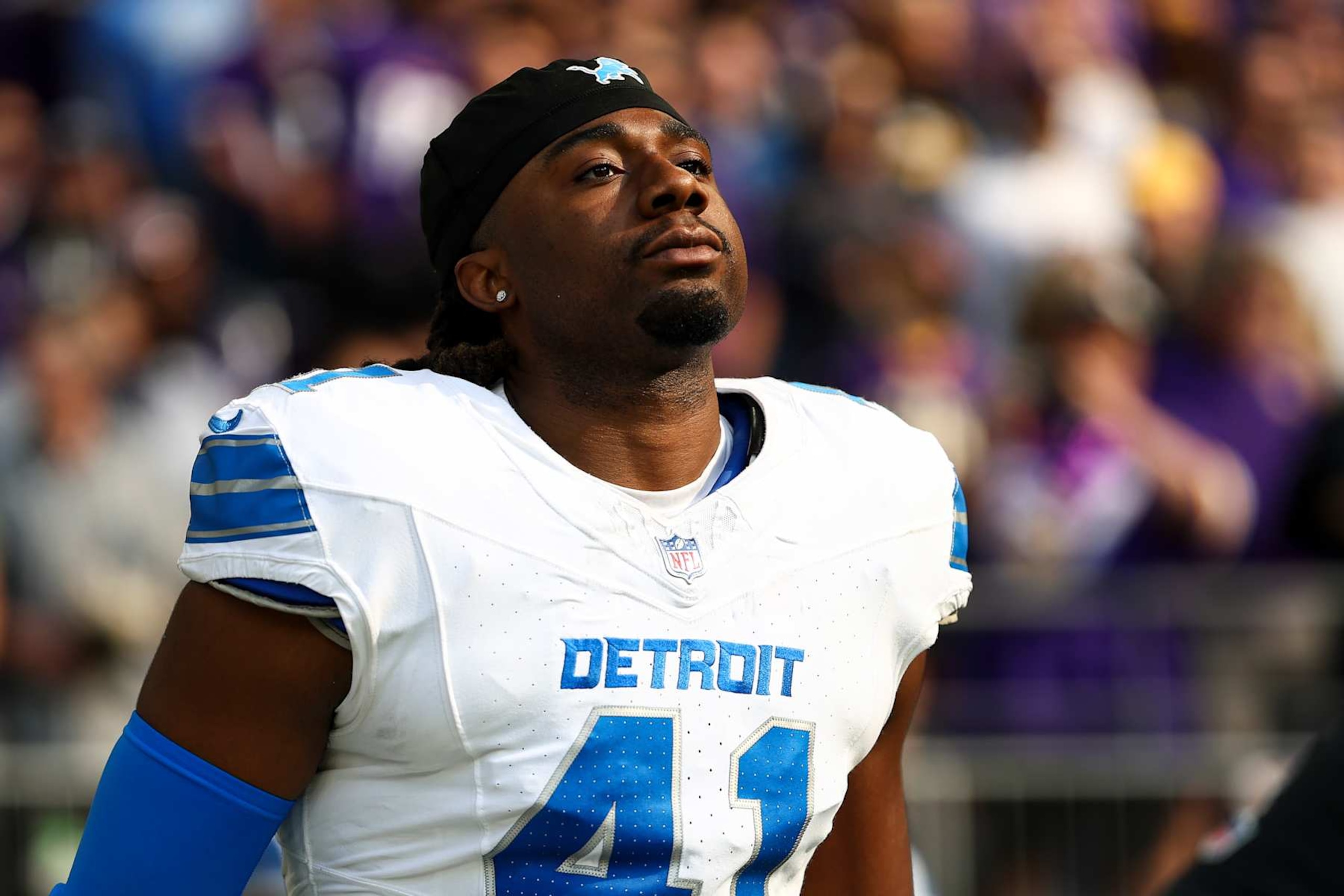 MINNEAPOLIS, MINNESOTA - OCTOBER 20: James Houston #41 of the Detroit Lions stands on the sidelines during the national anthem prior to an NFL football game against the Minnesota Vikings at U.S. Bank Stadium on October 20, 2024 in Minneapolis, Minnesota. (Photo by Kevin Sabitus/Getty Images)