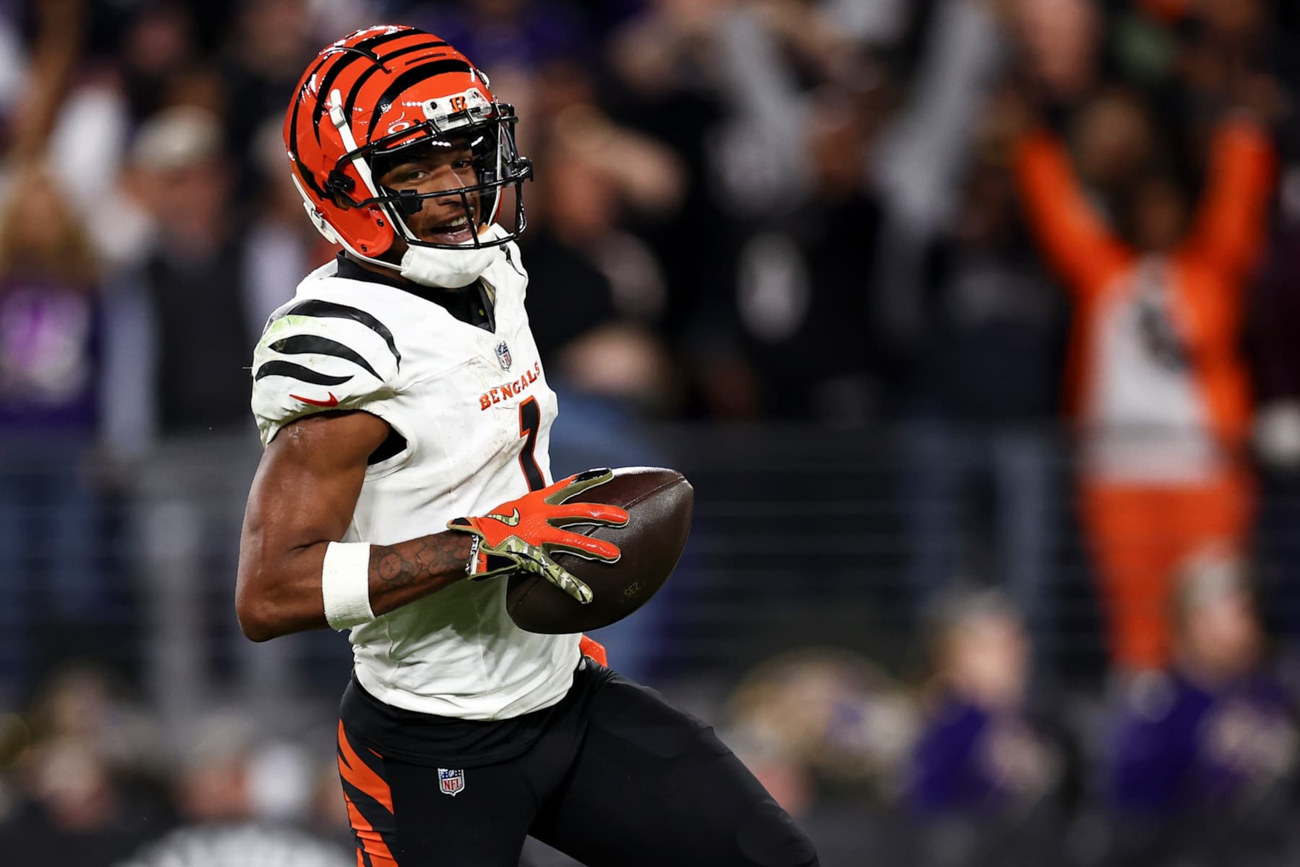 BALTIMORE, MARYLAND - NOVEMBER 7: Ja'Marr Chase #1 of the Cincinnati Bengals smiles while scoring a touchdown during an NFL football game against the Baltimore Ravens at M&T Bank Stadium on November 7, 2024 in Baltimore, Maryland. (Photo by Kevin Sabitus/Getty Images)