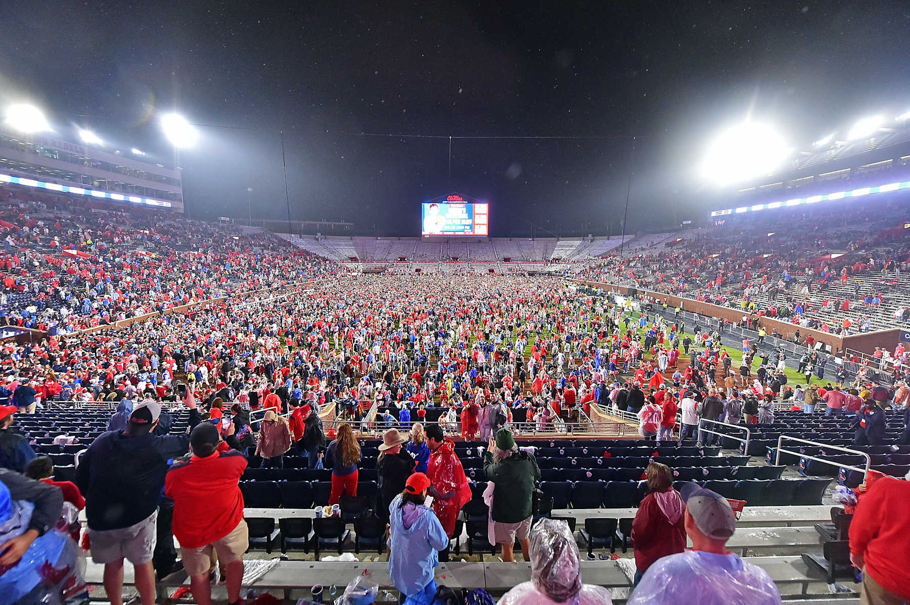 OXFORD, MISSISSIPPI - NOVEMBER 09: Fans storm the field after the game between the Mississippi Rebels and the Georgia Bulldogs at Vaught-Hemingway Stadium on November 09, 2024 in Oxford, Mississippi. (Photo by Justin Ford/Getty Images)
