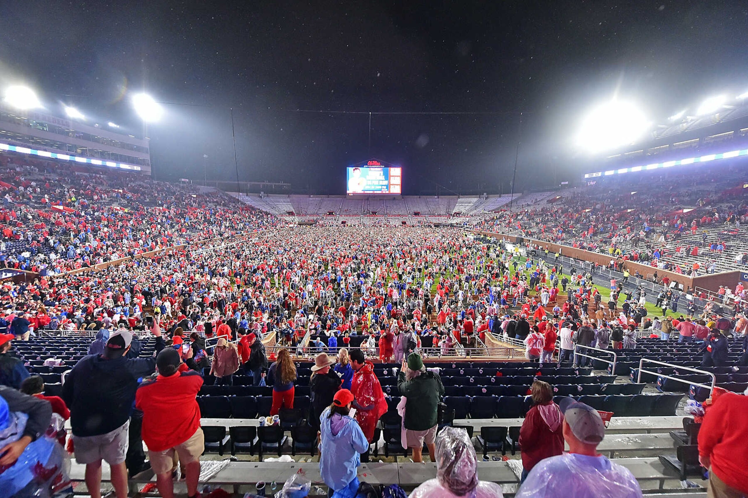 OXFORD, MISSISSIPPI - NOVEMBER 09: Fans storm the field after the game between the Mississippi Rebels and the Georgia Bulldogs at Vaught-Hemingway Stadium on November 09, 2024 in Oxford, Mississippi. (Photo by Justin Ford/Getty Images)
