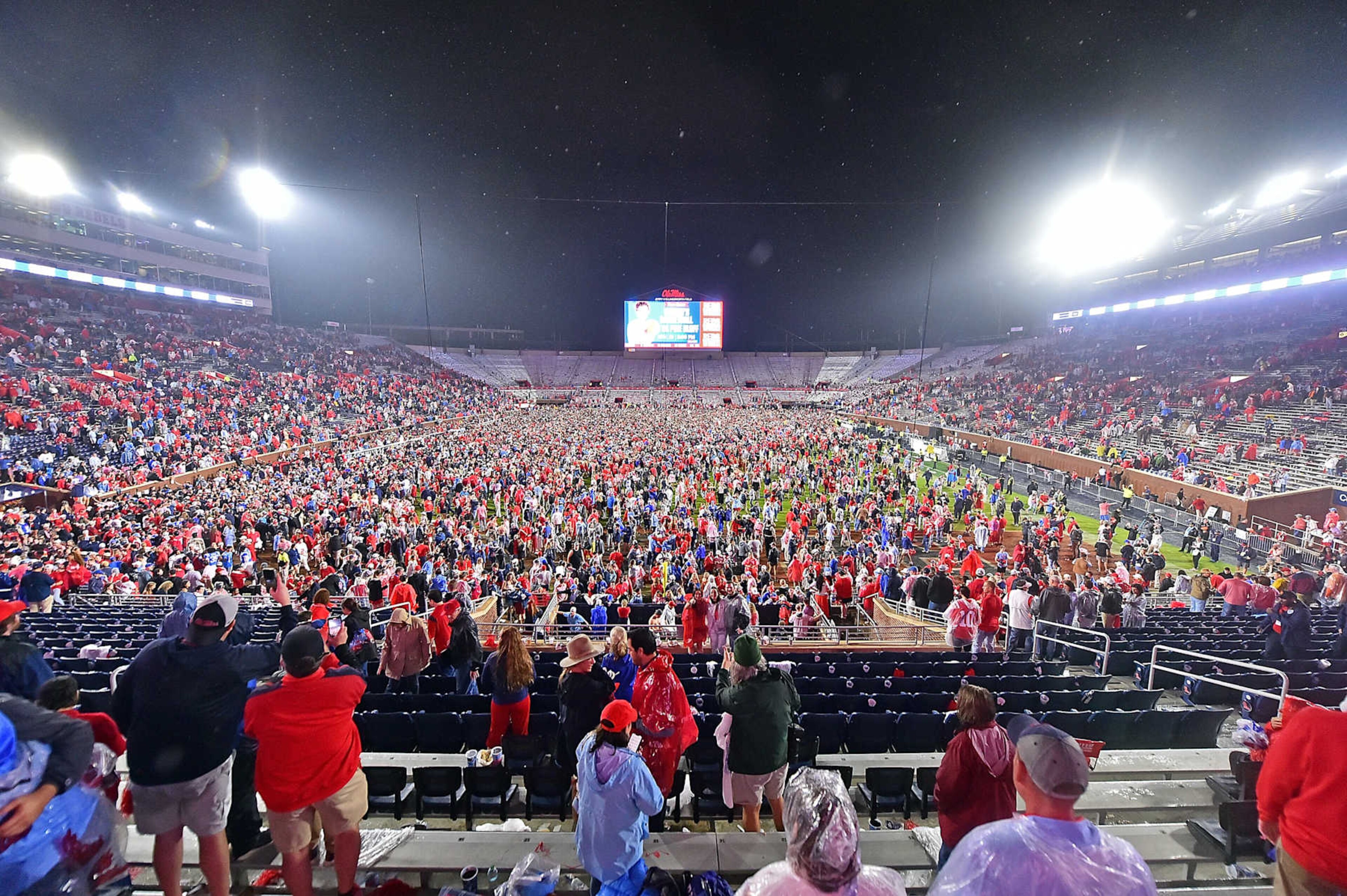 OXFORD, MISSISSIPPI - NOVEMBER 09: Fans storm the field after the game between the Mississippi Rebels and the Georgia Bulldogs at Vaught-Hemingway Stadium on November 09, 2024 in Oxford, Mississippi. (Photo by Justin Ford/Getty Images)