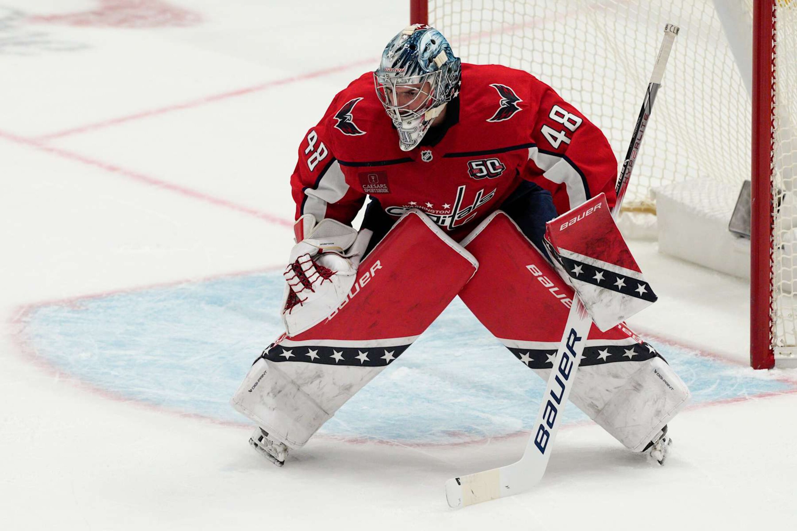 WASHINGTON, DC - OCTOBER 15: Logan Thompson #48 of the Washington Capitals stands in front of the net during the first period of a game against the Vegas Golden Knights at Capital One Arena on October 15, 2024 in Washington, D.C. (Photo by Jess Rapfogel/NHLI via Getty Images)