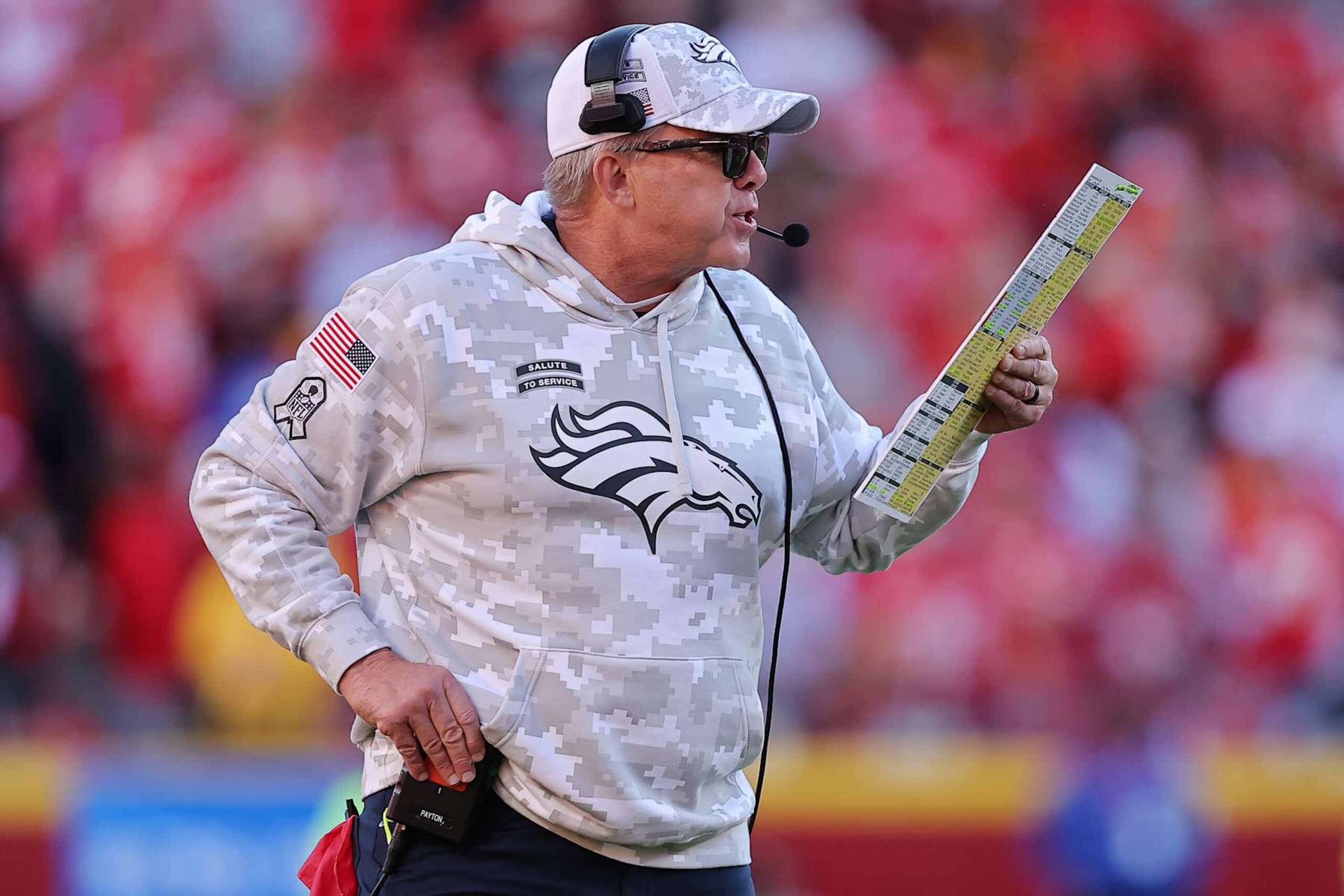 KANSAS CITY, MISSOURI - NOVEMBER 10: Head coach Sean Payton of the Denver Broncos looks at his play call sheet during the fourth quarter against the Kansas City Chiefs at GEHA Field at Arrowhead Stadium on November 10, 2024 in Kansas City, Missouri. (Photo by David Eulitt/Getty Images)
