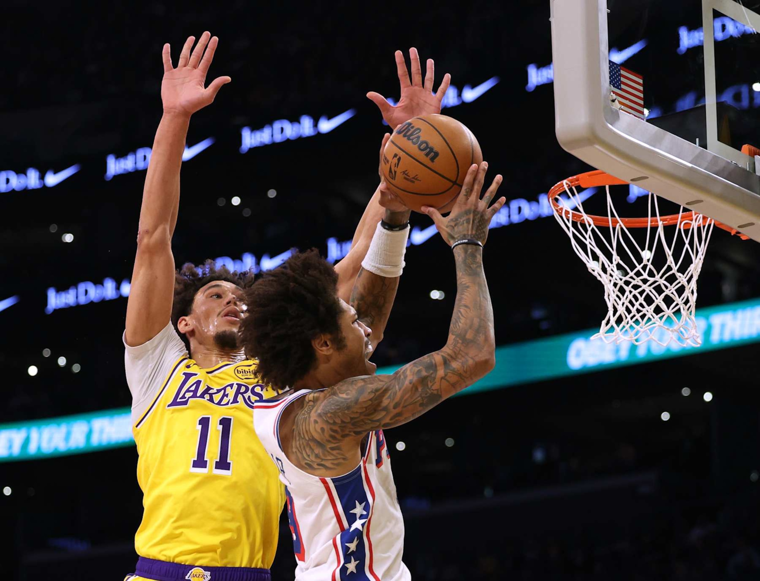 LOS ANGELES, CALIFORNIA - NOVEMBER 08: Kelly Oubre Jr. #9 of the Philadelphia 76ers reacts as he is fouled on a layup by Jaxson Hayes #11 of the Los Angeles Lakers during the first half at Crypto.com Arena on November 08, 2024 in Los Angeles, California. (Photo by Harry How/Getty Images) NOTE TO USER: User expressly acknowledges and agrees that, by downloading and/or using this Photograph, user is consenting to the terms and conditions of the Getty Images License Agreement. (Photo by Harry How/Getty Images)