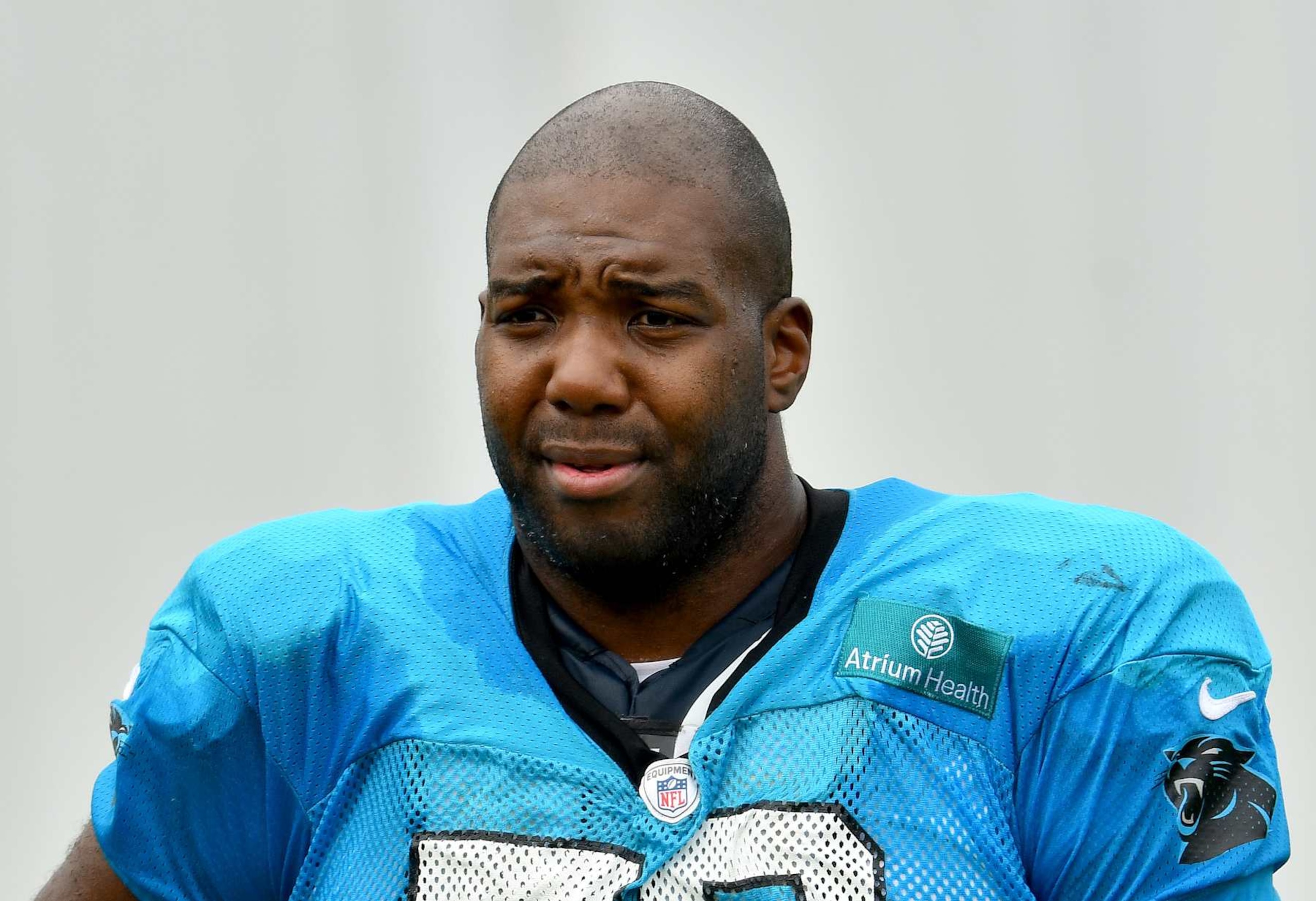 CHARLOTTE, NORTH CAROLINA - AUGUST 24: Russell Okung #76 of the Carolina Panthers waits between drills during a training camp session at Bank of America Stadium on August 24, 2020 in Charlotte, North Carolina. (Photo by Grant Halverson/Getty Images)