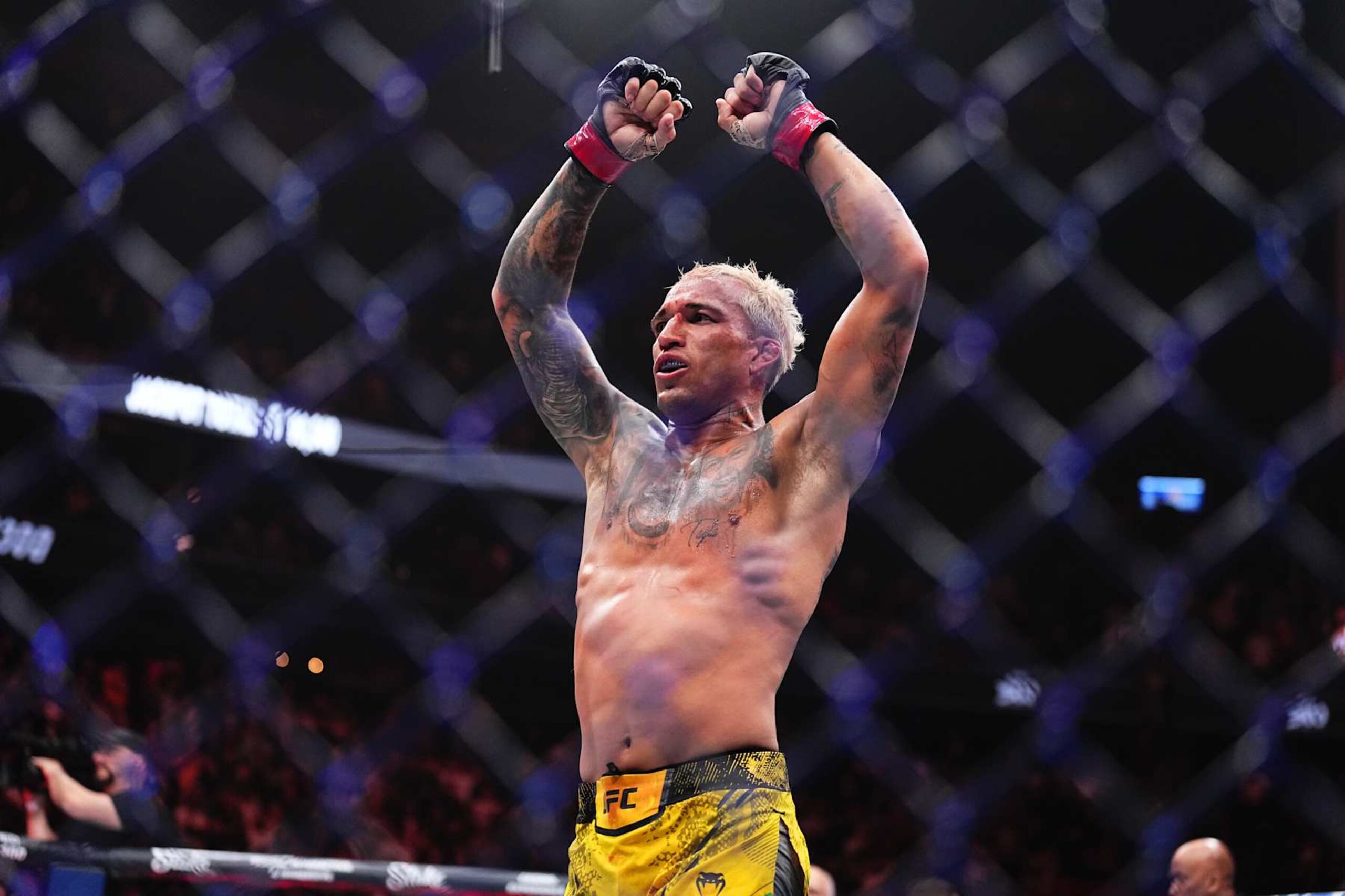 Charles Oliveira reacts at the end of a hard-fought three-round fight with Arman Tsarukyan. 