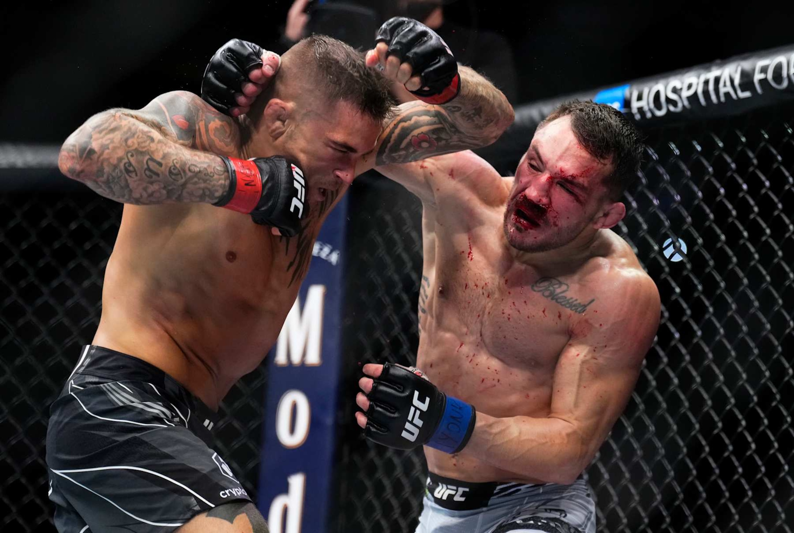NEW YORK, NEW YORK - NOVEMBER 12: (R-L) Michael Chandler punches Dustin Poirier in a lightweight bout during the UFC 281 event at Madison Square Garden on November 12, 2022 in New York City. (Photo by Chris Unger/Zuffa LLC)