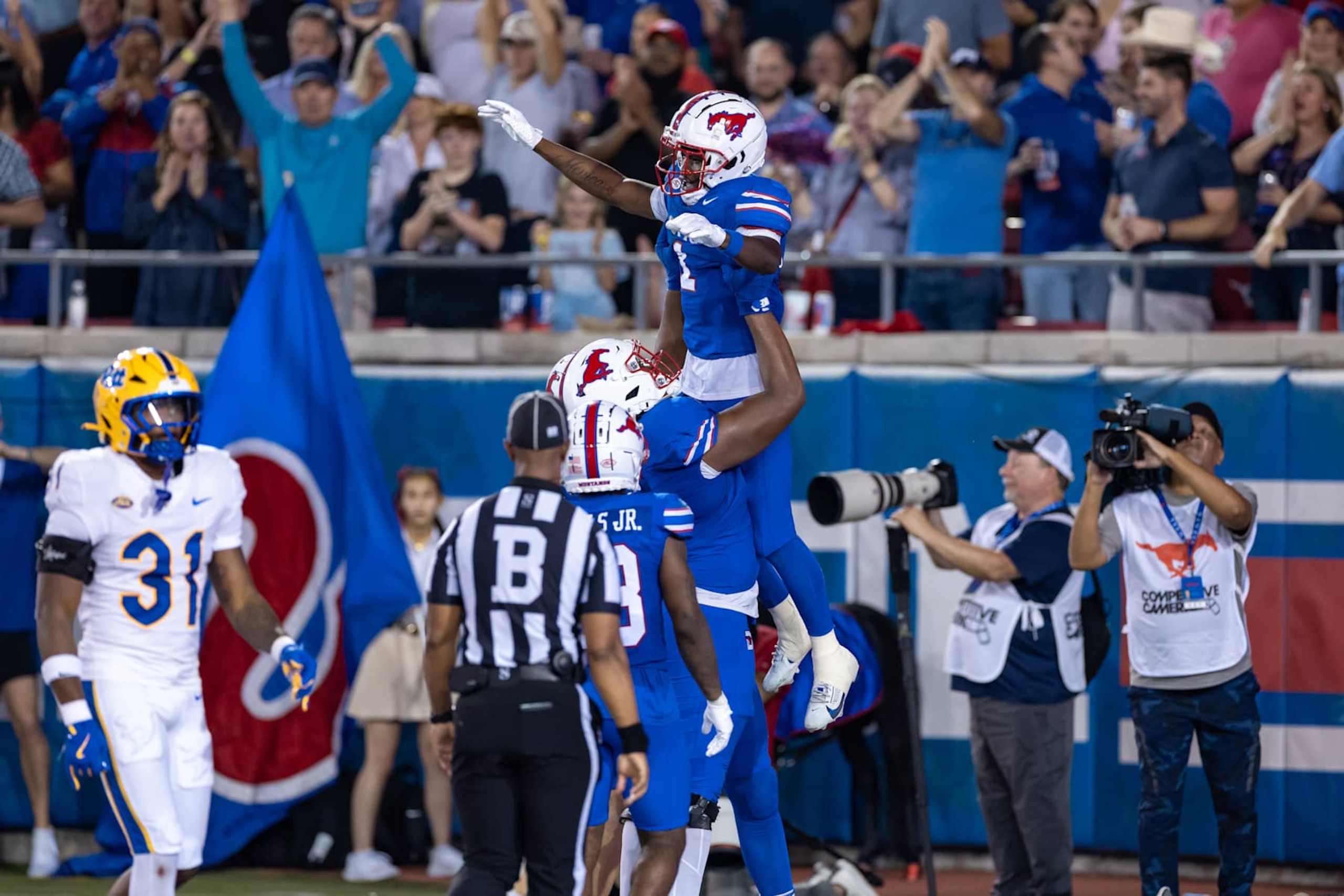 DALLAS, TX - NOVEMBER 02: SMU Mustangs running back Brashard Smith (#1) celebrates after scoring a touchdown during the college football game between the SMU Mustangs and the Pittsburgh Panthers on November 2, 2024, at Gerald J. Ford Stadium in Dallas, TX.  (Photo by Matthew Visinsky/Icon Sportswire via Getty Images)