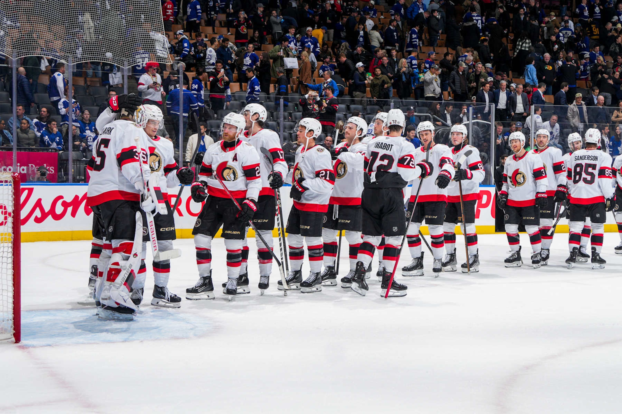 TORONTO, ON - NOVEMBER 12: Linus Ullmark #35 of the Ottawa Senators celebrates with teammates after defeating the Toronto Maple Leafs at Scotiabank Arena on November 12, 2024 in Toronto, Ontario, Canada. (Photo by Mark Blinch/NHLI via Getty Images) TORONTO, ON - NOVEMBER 12: Linus Ullmark #35 of the Ottawa Senators celebrates with teammates after defeating the Toronto Maple Leafs at Scotiabank Arena on November 12, 2024 in Toronto, Ontario, Canada. (Photo by Mark Blinch/NHLI via Getty Images)