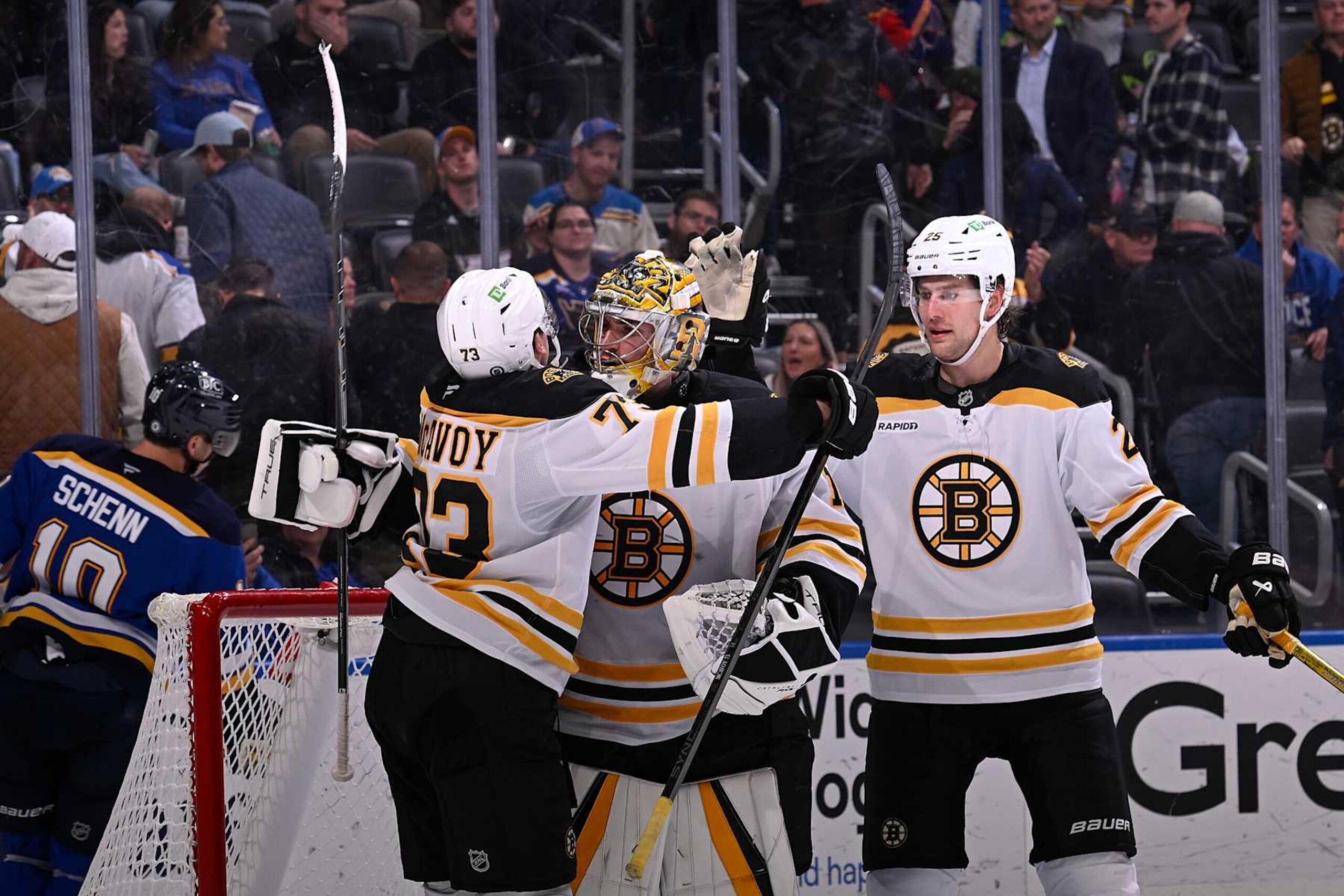 ST. LOUIS, MO - NOVEMBER 12: Charlie McAvoy #73 Jeremy Swayman #1 and Brandon Carlo #25 of the Boston Bruins celebrate after beating the St. Louis Blues 3-2 on November 12, 2024 at the Enterprise Center in St. Louis, Missouri. (Photo by Joe Puetz/NHLI via Getty Images) ST. LOUIS, MO - NOVEMBER 12: Charlie McAvoy #73 Jeremy Swayman #1 and Brandon Carlo #25 of the Boston Bruins celebrate after beating the St. Louis Blues 3-2 on November 12, 2024 at the Enterprise Center in St. Louis, Missouri. (Photo by Joe Puetz/NHLI via Getty Images)