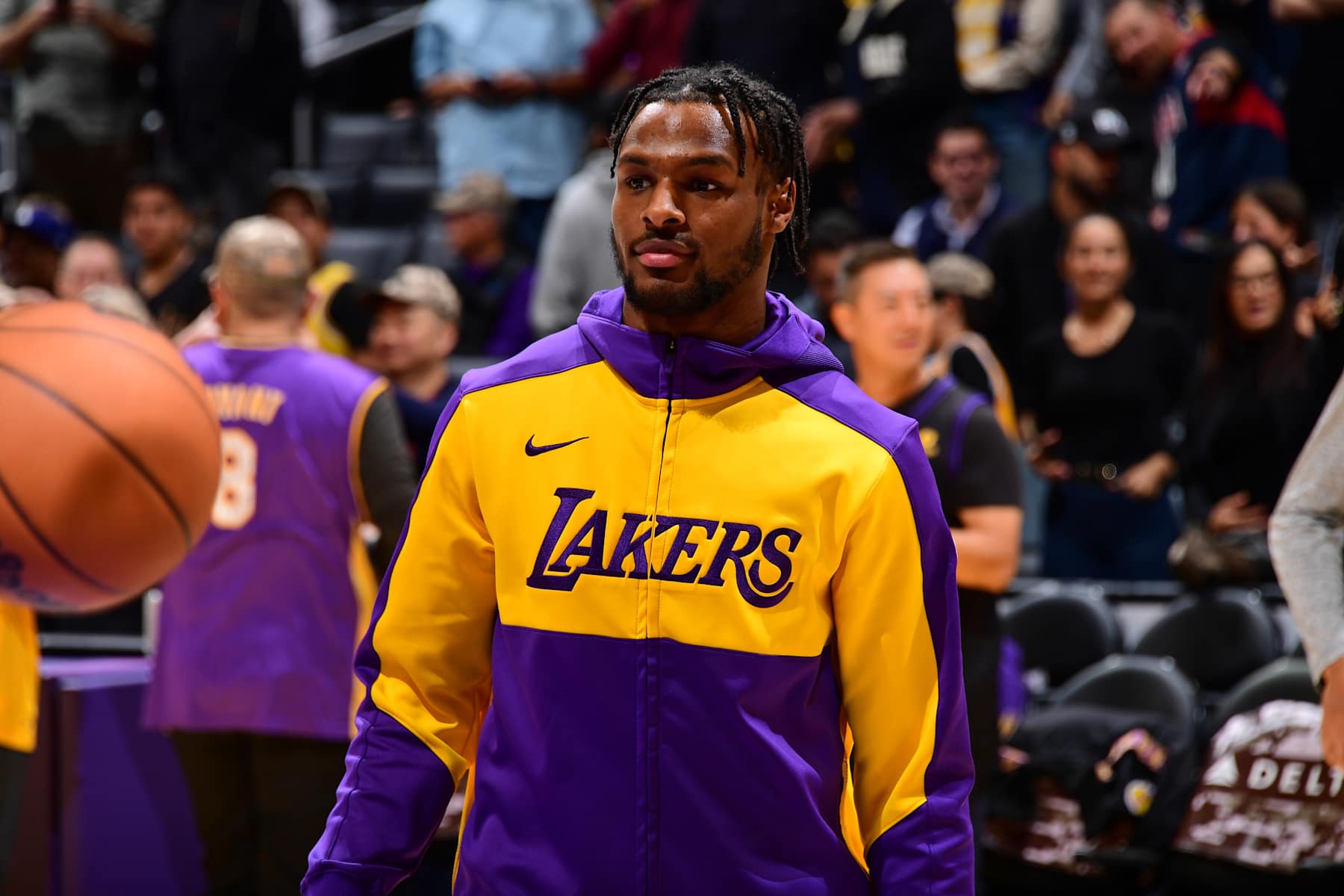 LOS ANGELES, CA - NOVEMBER 10: Bronny James #9 of the Los Angeles Lakers looks on during the game against the Toronto Raptors on November 10, 2024 at Crypto.Com Arena in Los Angeles, California. NOTE TO USER: User expressly acknowledges and agrees that, by downloading and/or using this Photograph, user is consenting to the terms and conditions of the Getty Images License Agreement. Mandatory Copyright Notice: Copyright 2024 NBAE (Photo by Adam Pantozzi/NBAE via Getty Images)