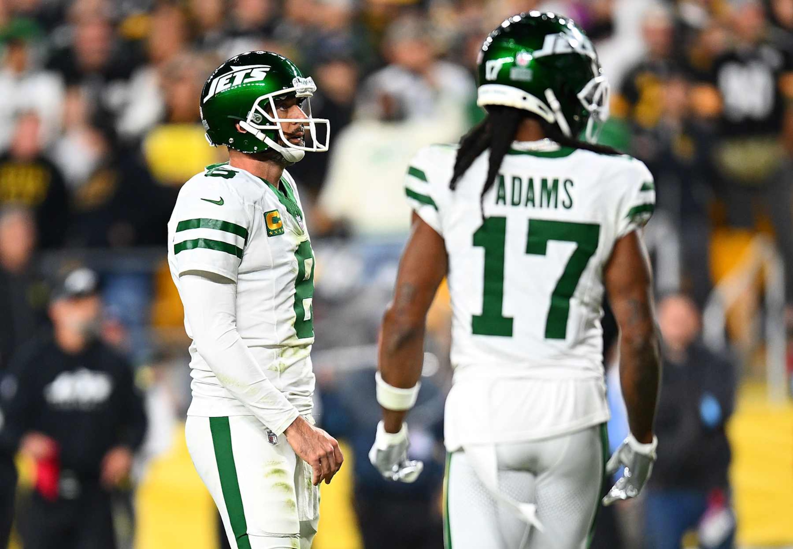 PITTSBURGH, PENNSYLVANIA - OCTOBER 20:  Aaron Rodgers #8 of the New York Jets looks on in front of Davante Adams #17 during the game against the Pittsburgh Steelers at Acrisure Stadium on October 20, 2024 in Pittsburgh, Pennsylvania. (Photo by Joe Sargent/Getty Images)