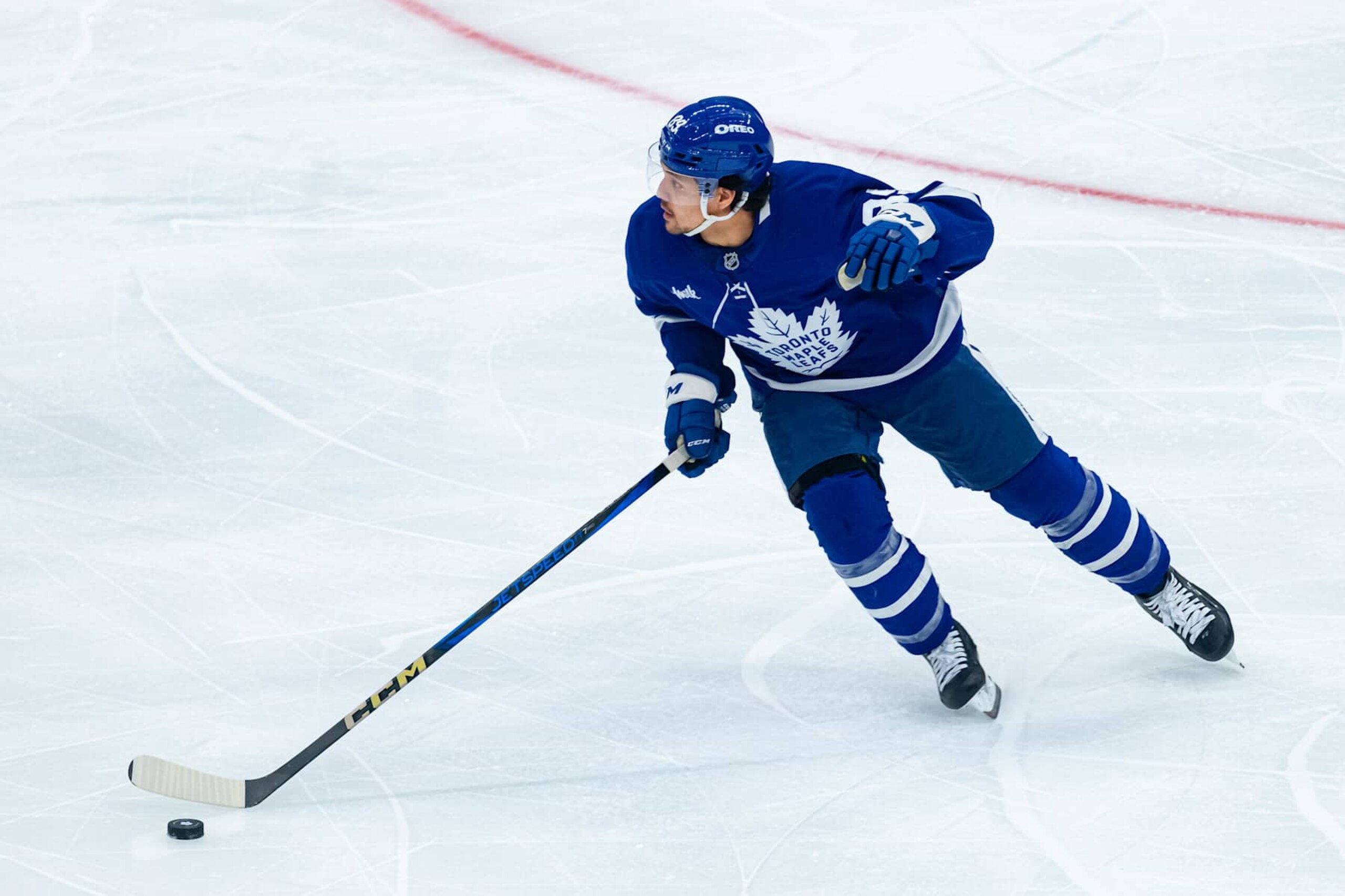 TORONTO, ON - NOVEMBER 05: Toronto Maple Leafs Right Wing Nicholas Robertson (89) skates with the puck during the NHL regular season game between the Boston Bruins and the Toronto Maple Leafs on November 5, 2024, at Scotiabank Arena in Toronto, ON, Canada. (Photo by Julian Avram/Icon Sportswire via Getty Images)