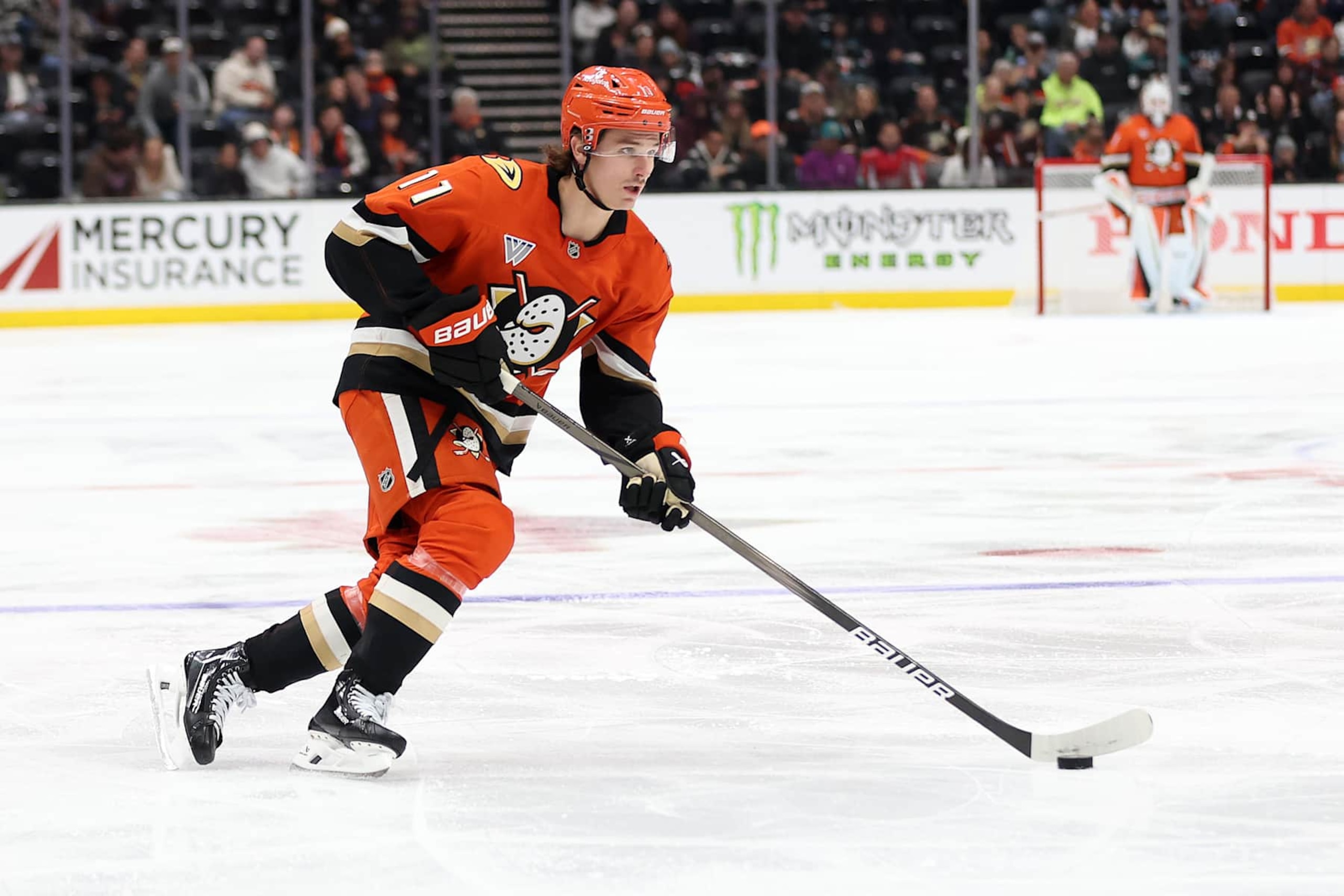 ANAHEIM, CALIFORNIA - NOVEMBER 08: Trevor Zegras #11 of the Anaheim Ducks controls the puck during the first period of a game against the Minnesota Wild at Honda Center on November 08, 2024 in Anaheim, California. (Photo by Sean M. Haffey/Getty Images)