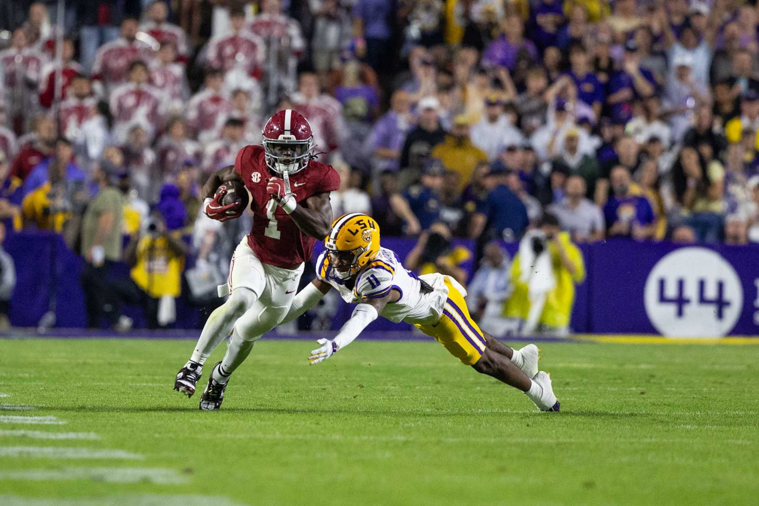BATON ROUGE, LOUISIANA - NOVEMBER 09: Kendrick Law #1 of the Alabama Crimson Tide runs the ball against the LSU Tigers at Tiger Stadium on November 9, 2024 in Baton Rouge, Louisiana. (Photo by Aric Becker/ISI Photos/Getty Images)