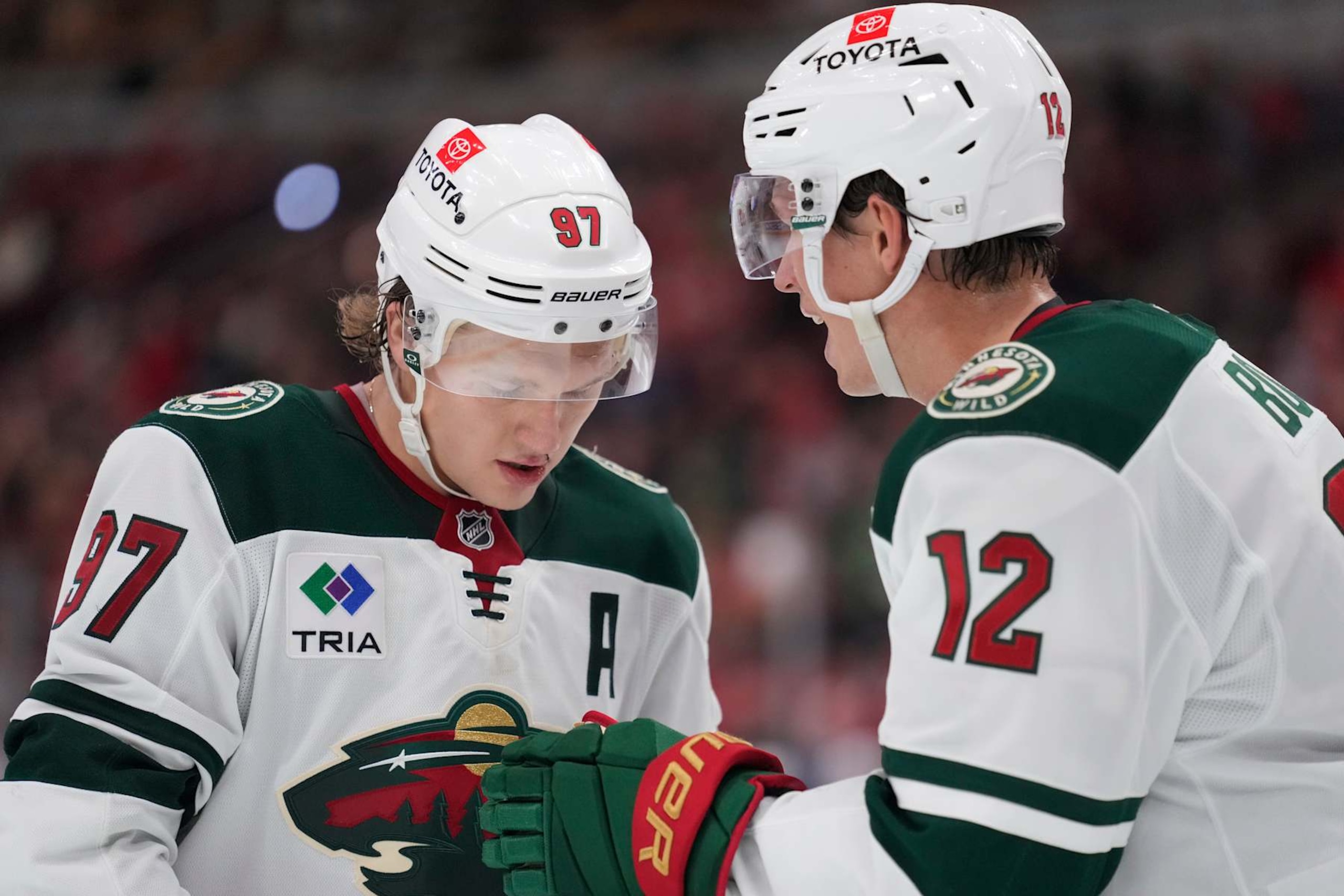 CHICAGO, ILLINOIS - NOVEMBER 10: Kirill Kaprizov #97 and Matt Boldy #12 of the Minnesota Wild talk during the third period against the Chicago Blackhawks at the United Center on November 10, 2024 in Chicago, Illinois. (Photo by Patrick McDermott/Getty Images) CHICAGO, ILLINOIS - NOVEMBER 10: Kirill Kaprizov #97 and Matt Boldy #12 of the Minnesota Wild talk during the third period against the Chicago Blackhawks at the United Center on November 10, 2024 in Chicago, Illinois. (Photo by Patrick McDermott/Getty Images)