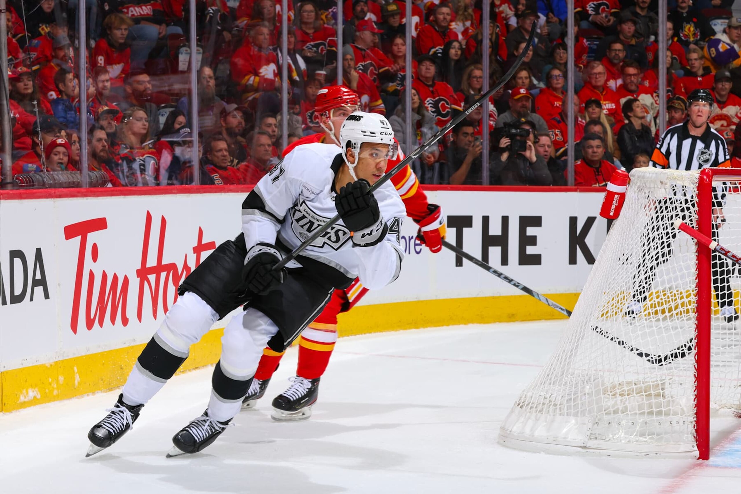 CALGARY, AB - NOVEMBER 11: Tyson Barrie #8 of the Calgary Flames skates against Andre Lee #47 of the Los Angeles Kings at Scotiabank Saddledome on November 11, 2024 in Calgary, Alberta, Canada. (Photo by Gerry Thomas/NHLI via Getty Images) CALGARY, AB - NOVEMBER 11: Tyson Barrie #8 of the Calgary Flames skates against Andre Lee #47 of the Los Angeles Kings at Scotiabank Saddledome on November 11, 2024 in Calgary, Alberta, Canada. (Photo by Gerry Thomas/NHLI via Getty Images)