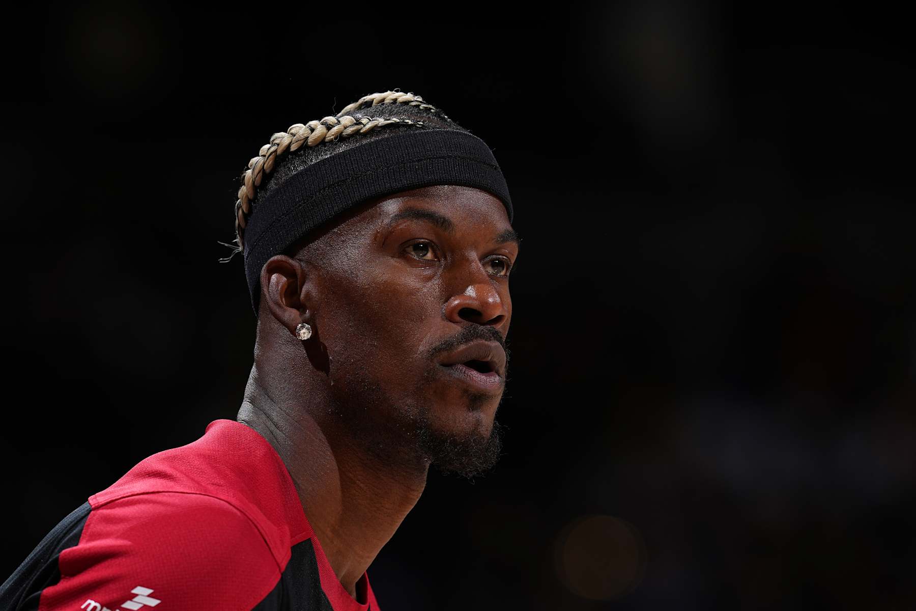 DENVER, CO - NOVEMBER 8: Jimmy Butler #22 of the Miami Heat looks on before the game against the Denver Nuggets on November 8, 2024 at Ball Arena in Denver, Colorado. NOTE TO USER: User expressly acknowledges and agrees that, by downloading and/or using this Photograph, user is consenting to the terms and conditions of the Getty Images License Agreement. Mandatory Copyright Notice: Copyright 2024 NBAE (Photo by Bart Young/NBAE via Getty Images)