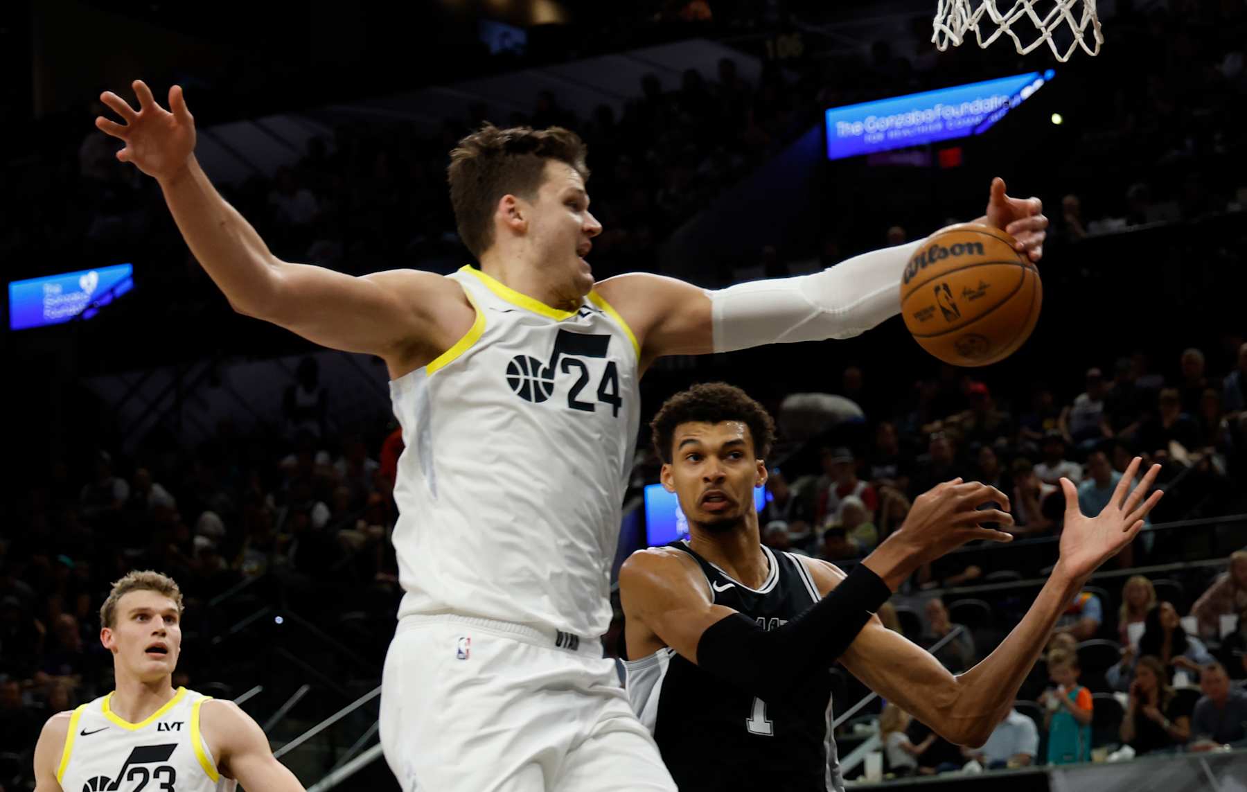 SAN ANTONIO, TX - NOVEMBER 9:  Walker Kessler #24 of the Utah Jazz grabs a rebound by Victor Wembanyama #1 of the San Antonio Spurs in the second half at Frost Bank Center on November 9, 2024 in San Antonio, Texas. NOTE TO USER: User expressly acknowledges and agrees that, by downloading and or using this photograph, User is consenting to terms and conditions of the Getty Images License Agreement. (Photo by Ronald Cortes/Getty Images)