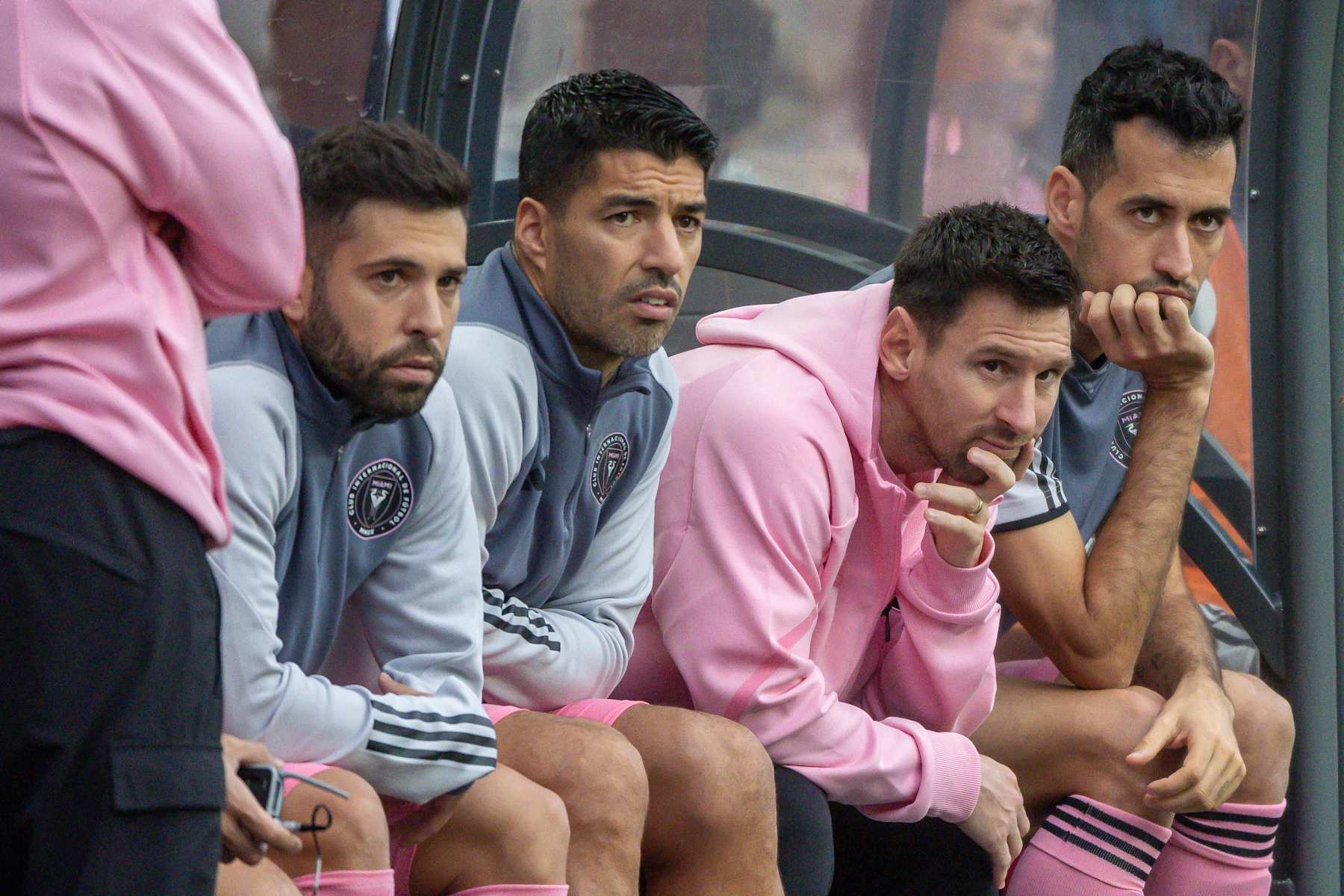 HONG KONG, CHINA - FEBRUARY 4: (from L to R) Jordi Alba, Luis Suarez, Lionel Messi and Sergio Busquets of Inter Miami CF sit on the bench during the preseason friendly match between Hong Kong Team and Inter Miami at Hong Kong Stadium on February 4, 2024 in Hong Kong, China. (Photo by Edmund So/Eurasia Sport Images/Getty Images)