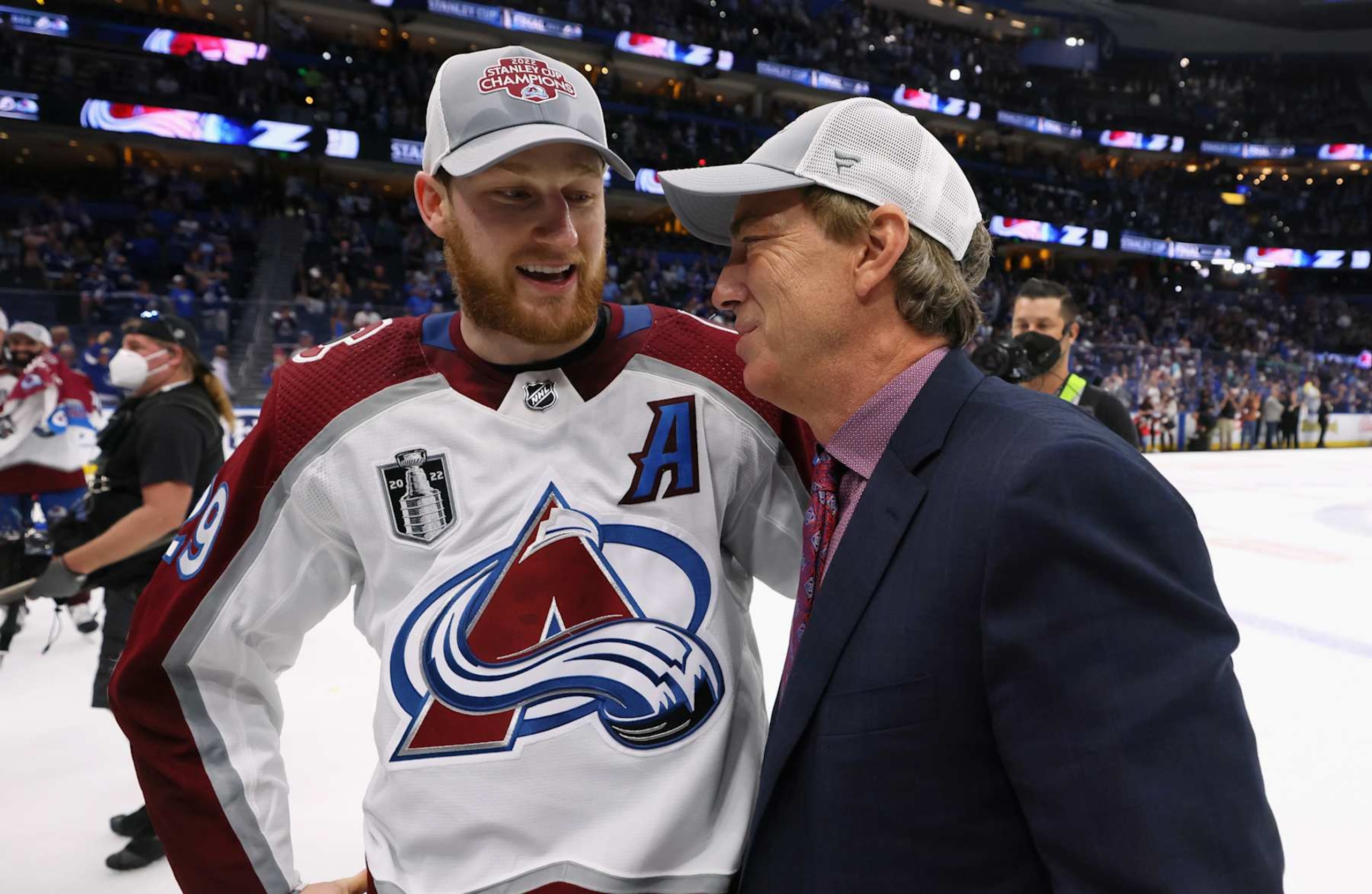 Colorado Avalanche center Nathan MacKinnon and Avalanche president of hockey operations Joe Sakic. Colorado Avalanche center Nathan MacKinnon and Avalanche president of hockey operations Joe Sakic.